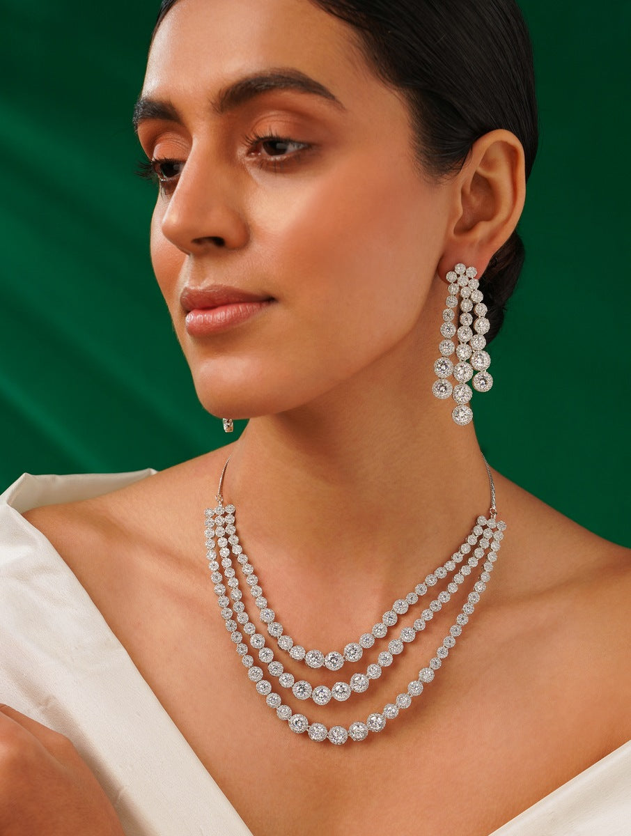 Model wearing Silver Plated American Diamond Multilayer Necklace Set By Abdesigns Jewellery with matching drop earrings