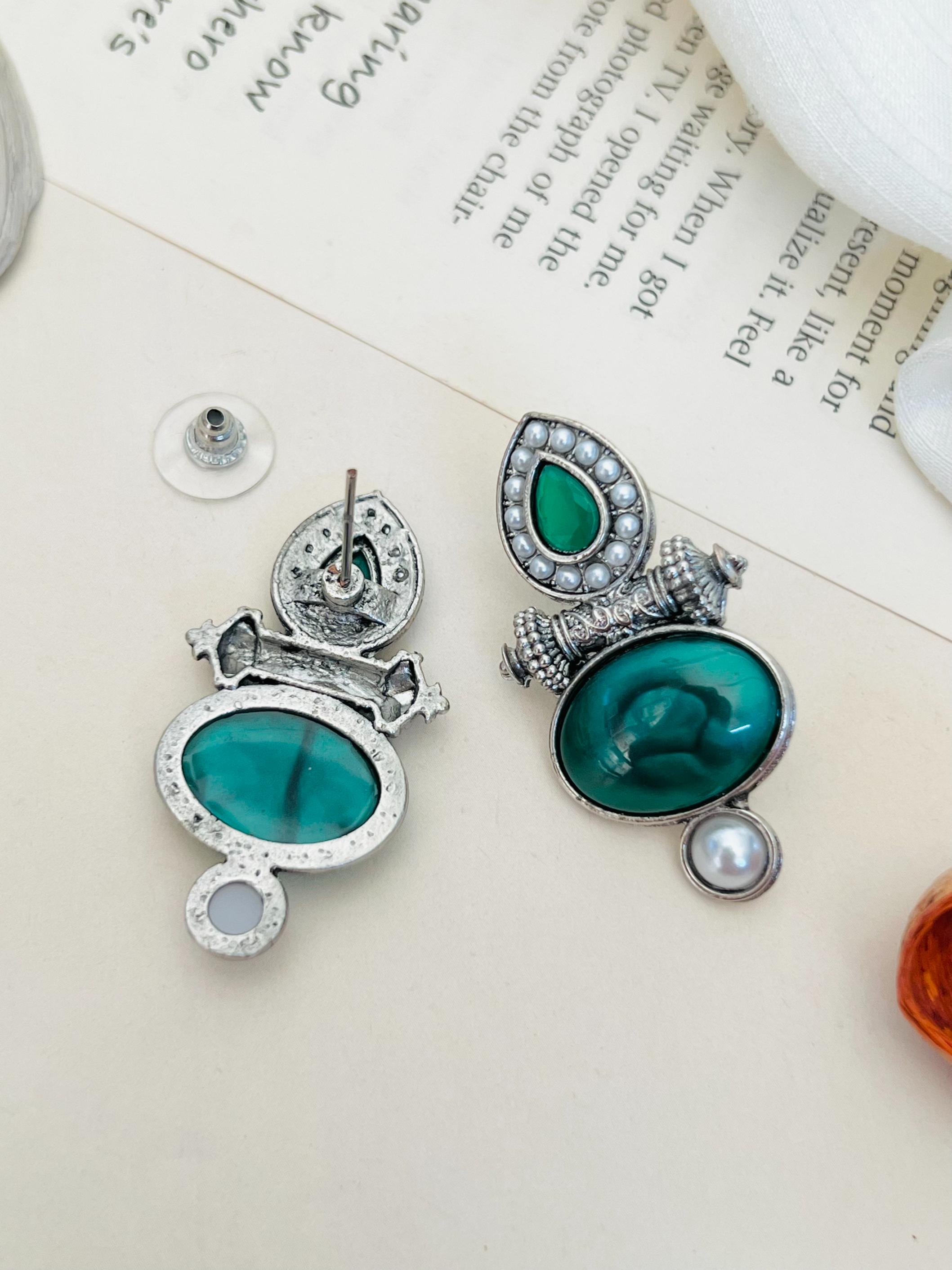 Abdesigns Jewellery Silver Plated Blue Stone Pearl Earrings with intricate design and pearl detail