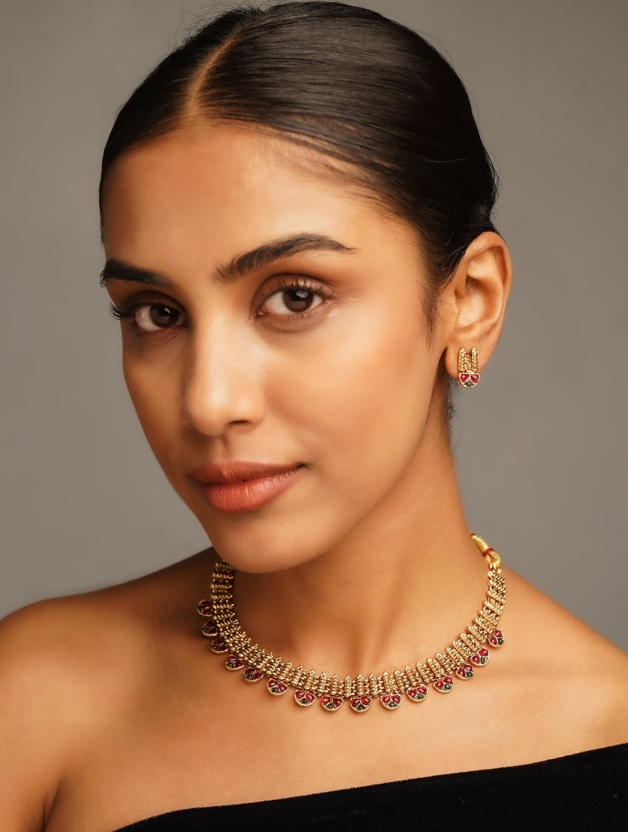 Abdesigns Jewellery Traditional Gold Finish Necklace Set worn by woman with matching earrings