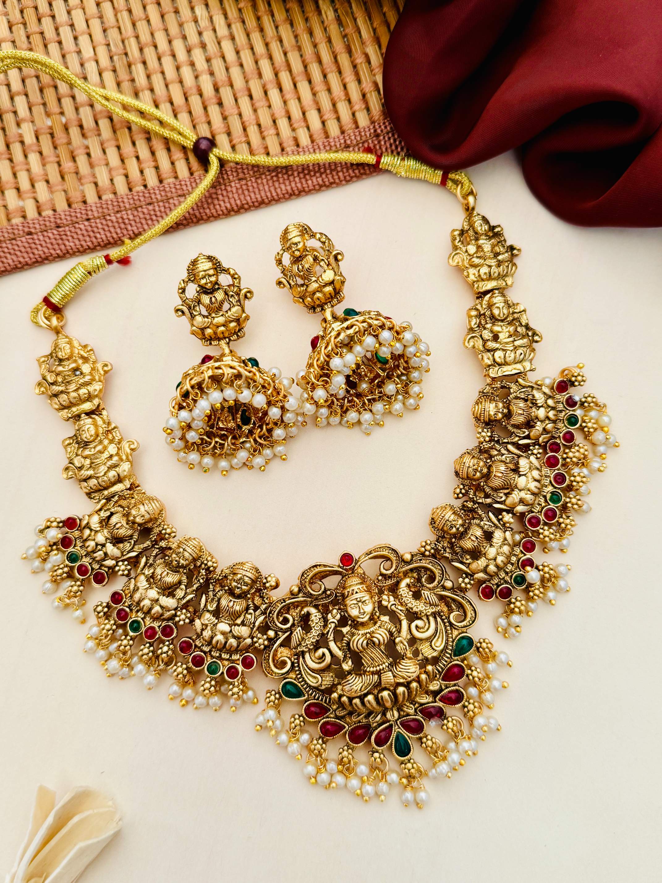 Abdesigns Jewellery Traditional Gold Necklace with Pearls featuring intricate temple design and matching earrings