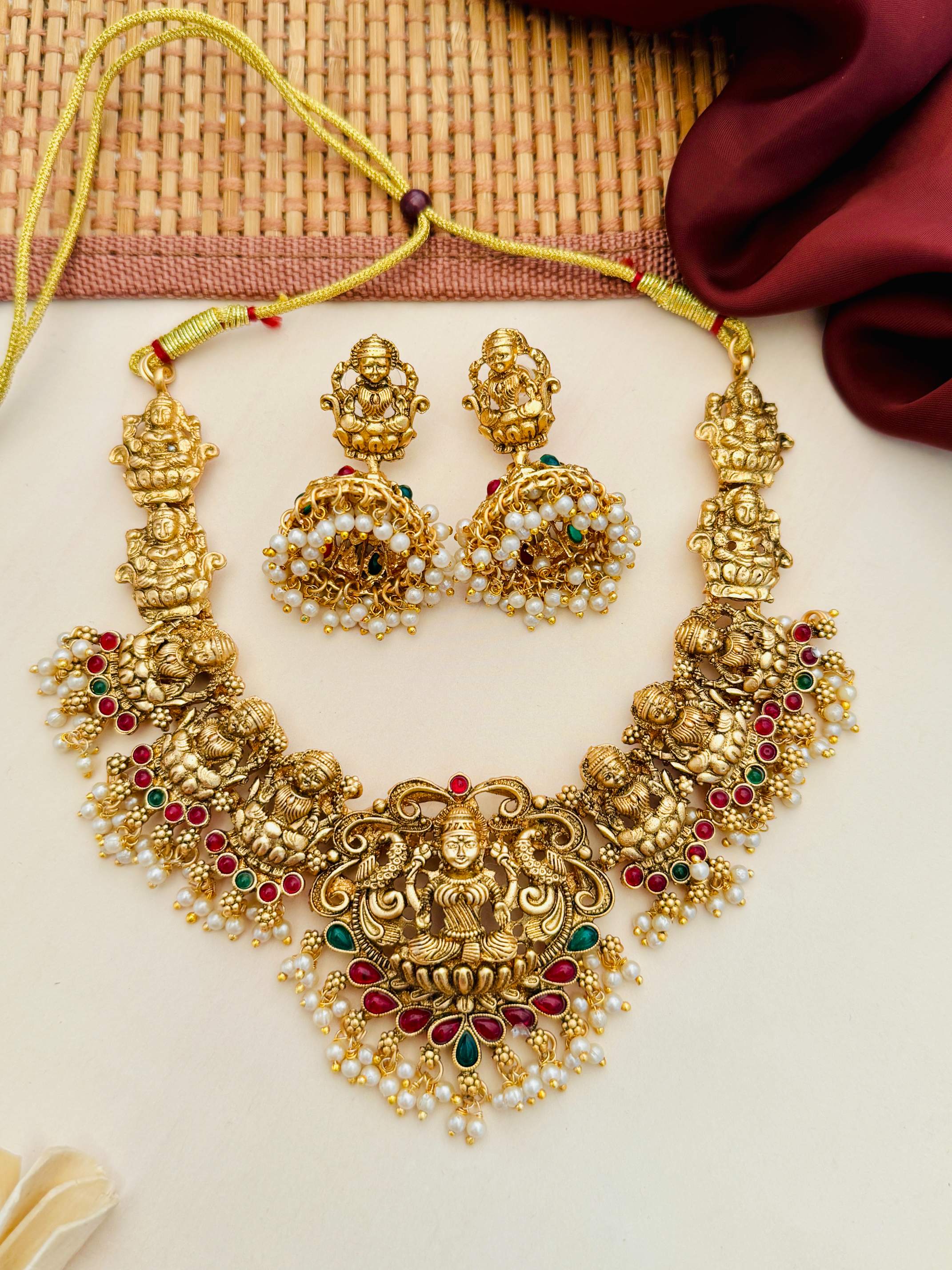 Abdesigns Jewellery Traditional Gold Necklace with Pearls featuring intricate gold detailing and matching earrings