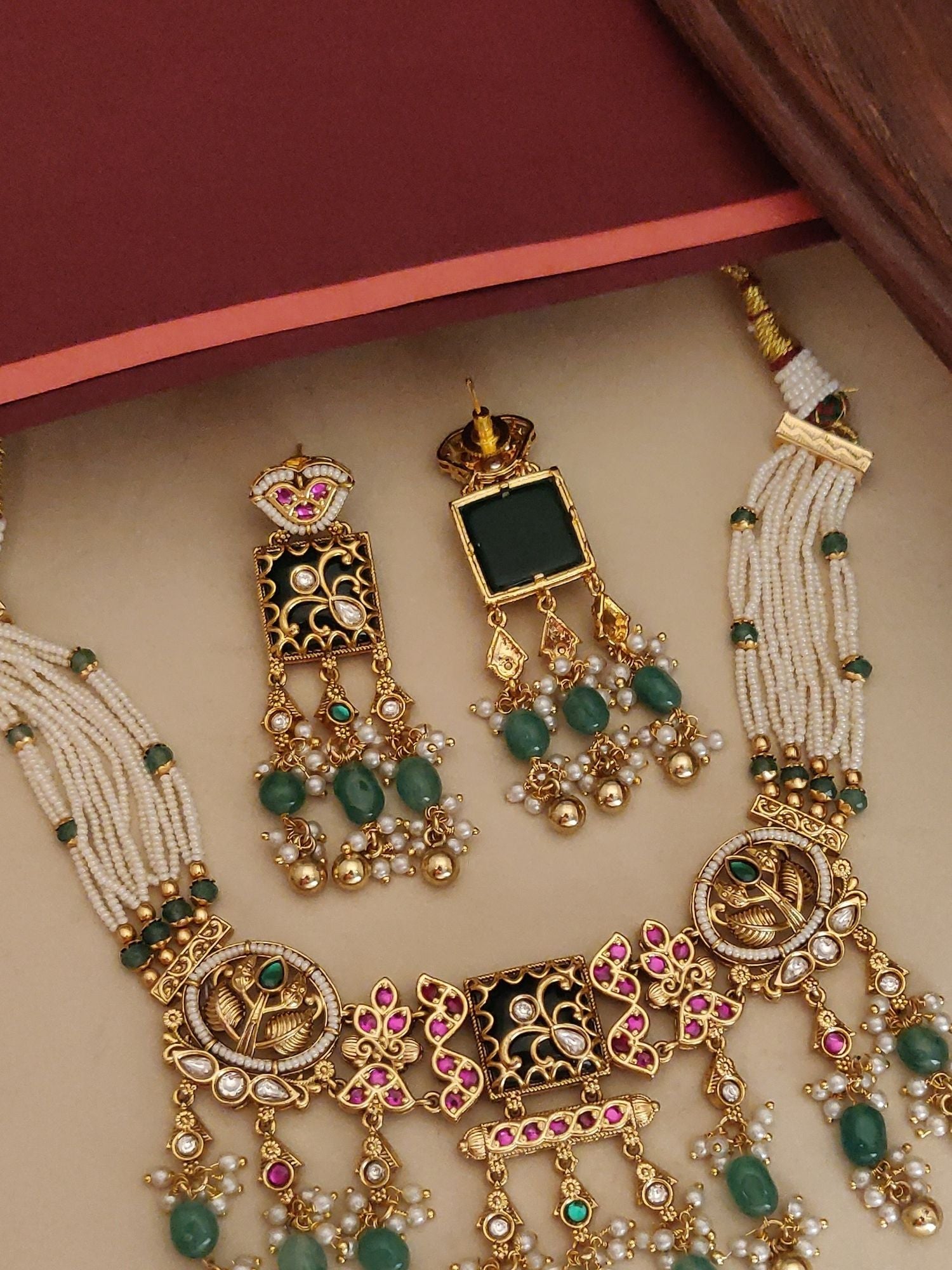 Abdesigns Jewellery Traditional Necklace Set with Earrings featuring intricate gold design and multicolor stones