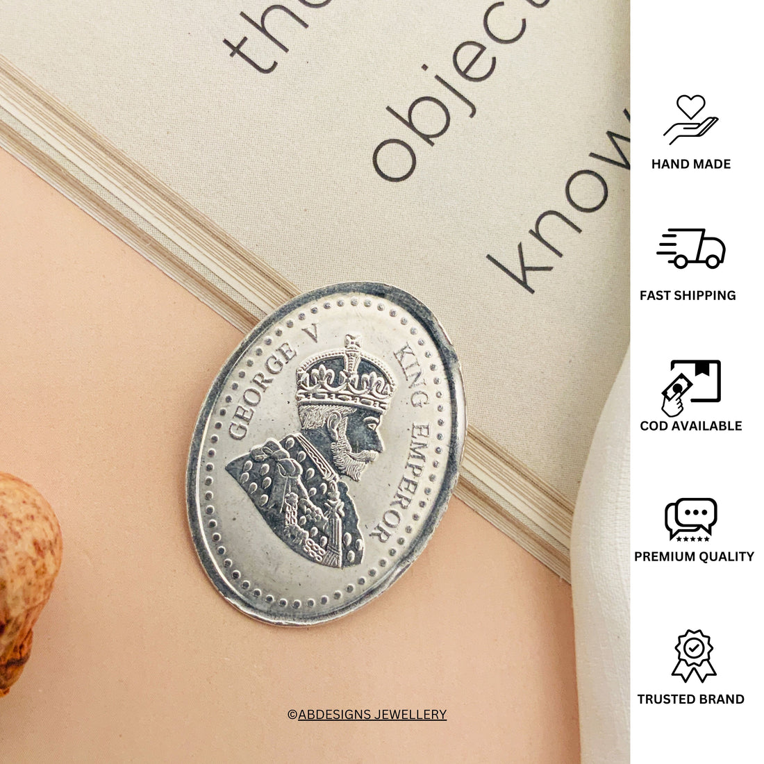 Abdesignsjewellery King George sterling silver coin pendant oval vintage portrait design on book backdrop