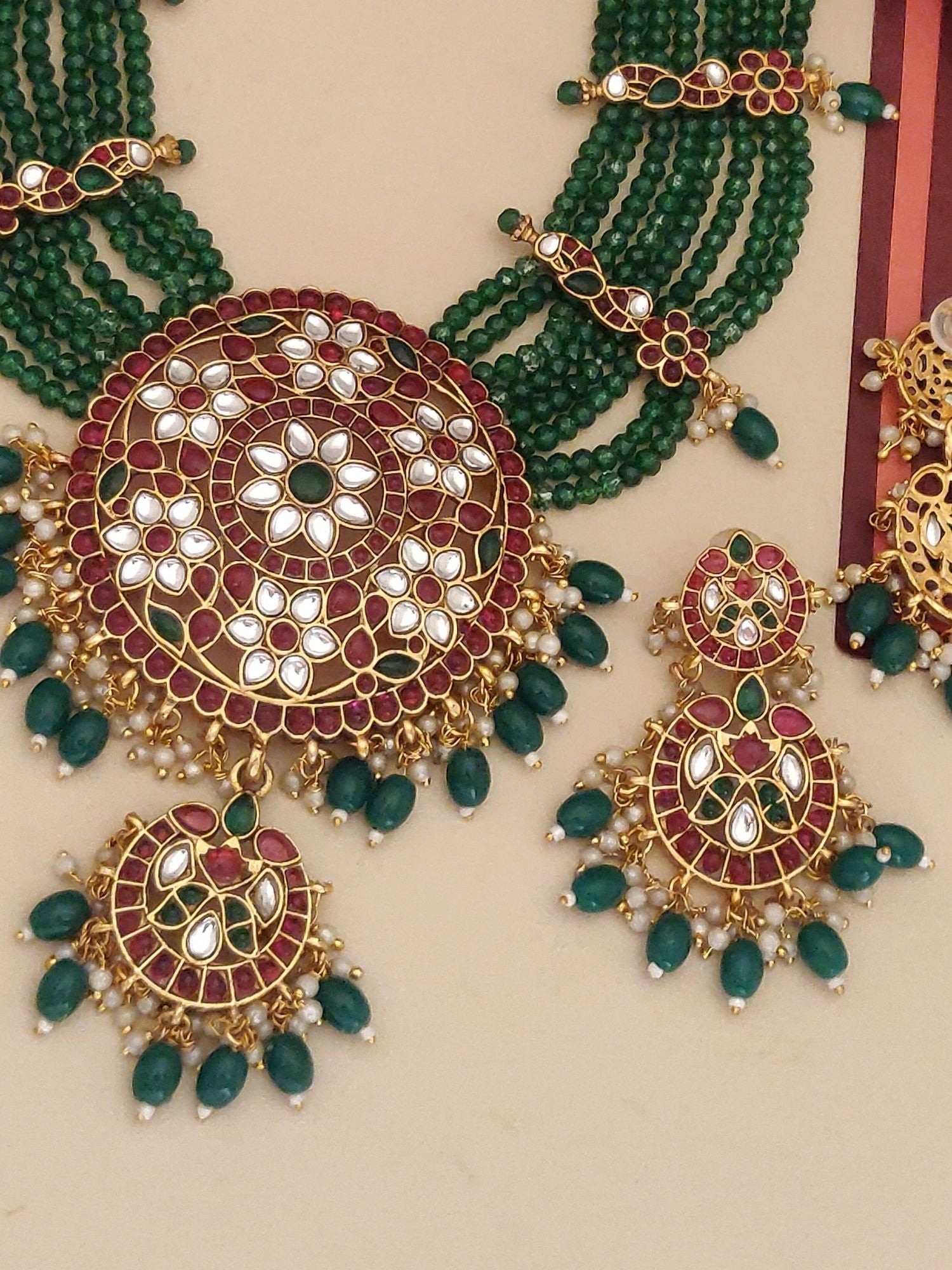 Abdesignsjewellery kundan green beads pendant set with multi strand green beads gold kundan floral pendant and earrings
