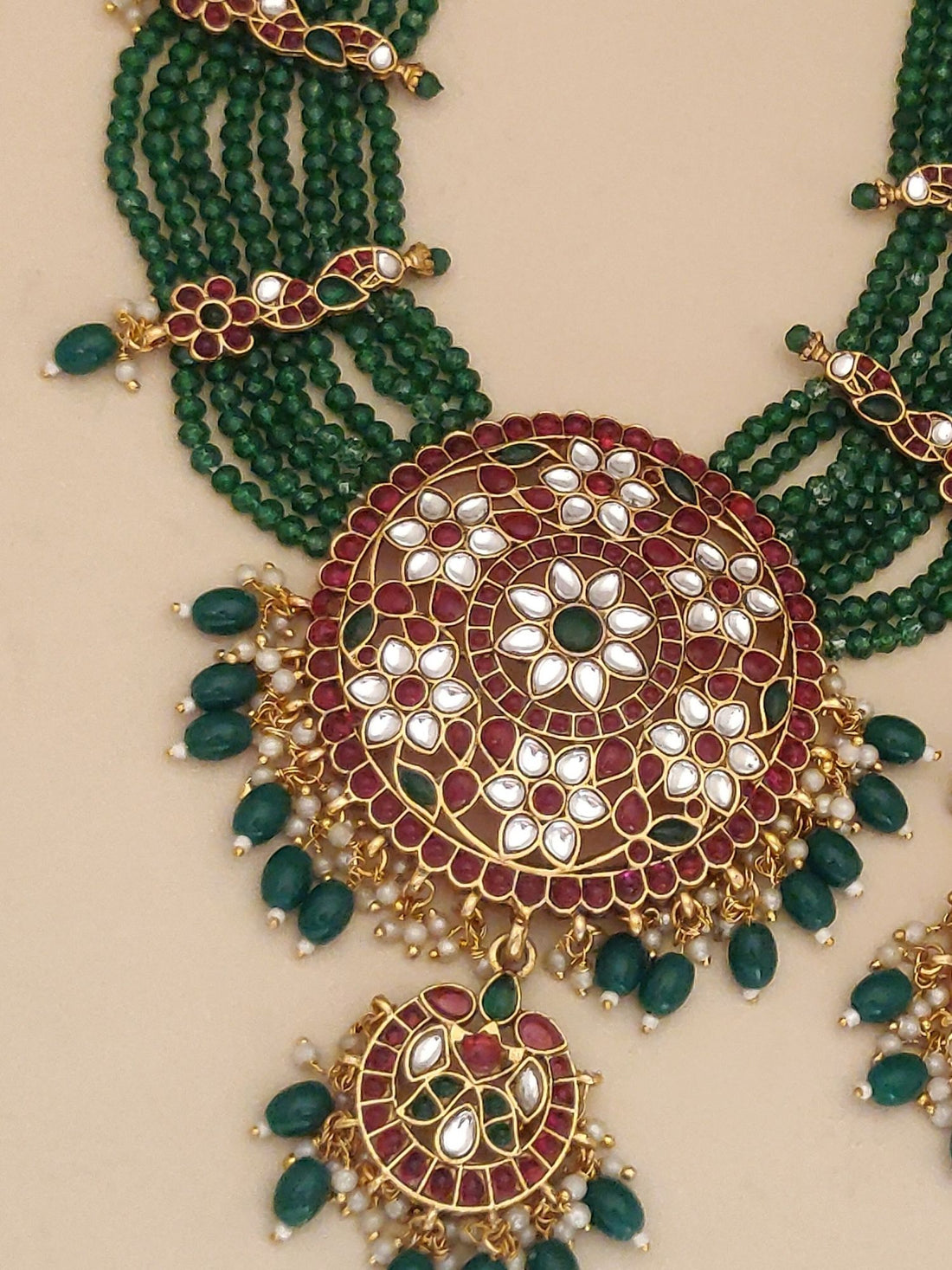 kundan green beads pendant set multistrand green bead necklace with large kundan medallion and matching earrings