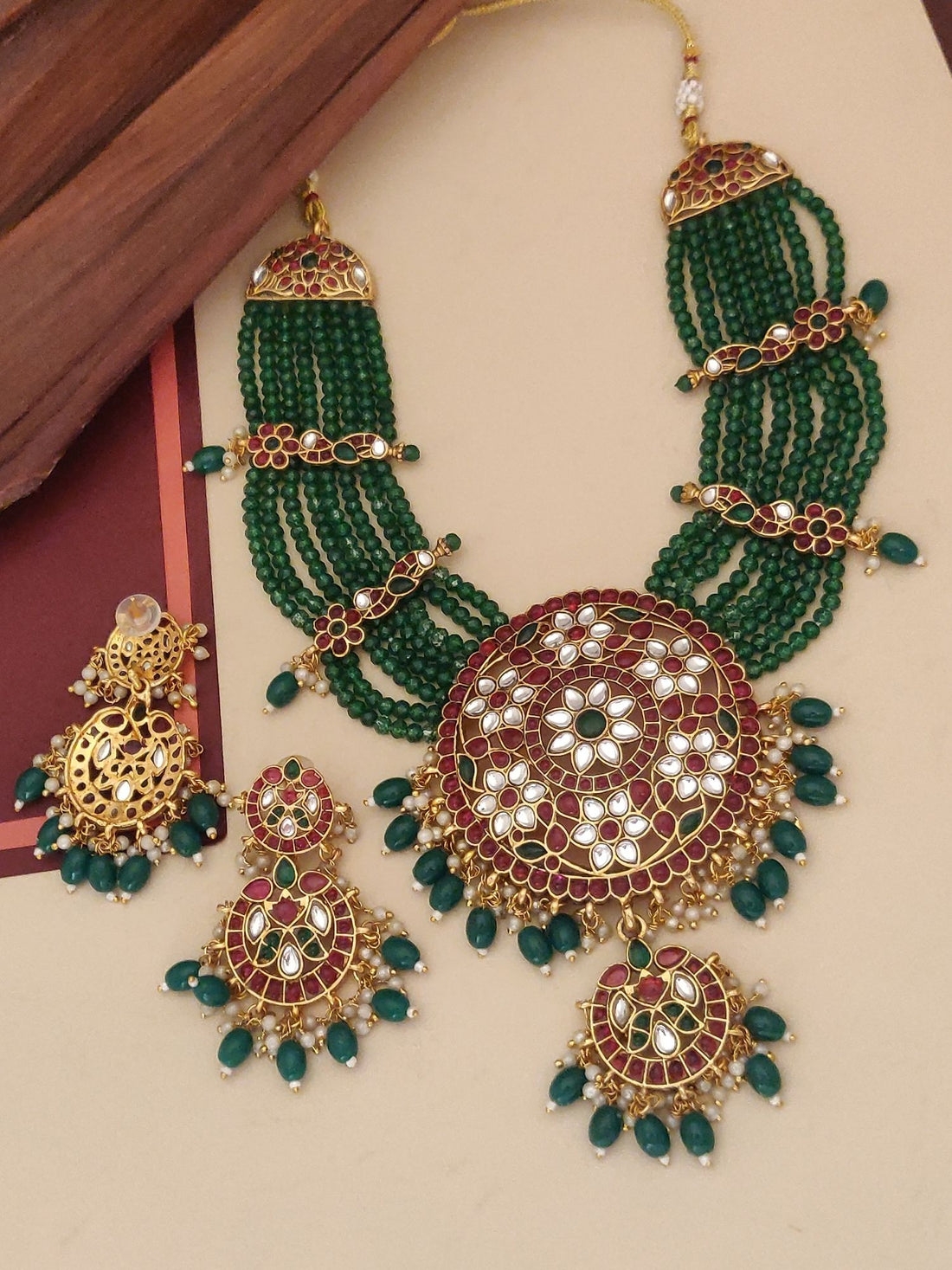 kundan green beads pendant set multistrand green bead necklace with large kundan medallion and matching earrings