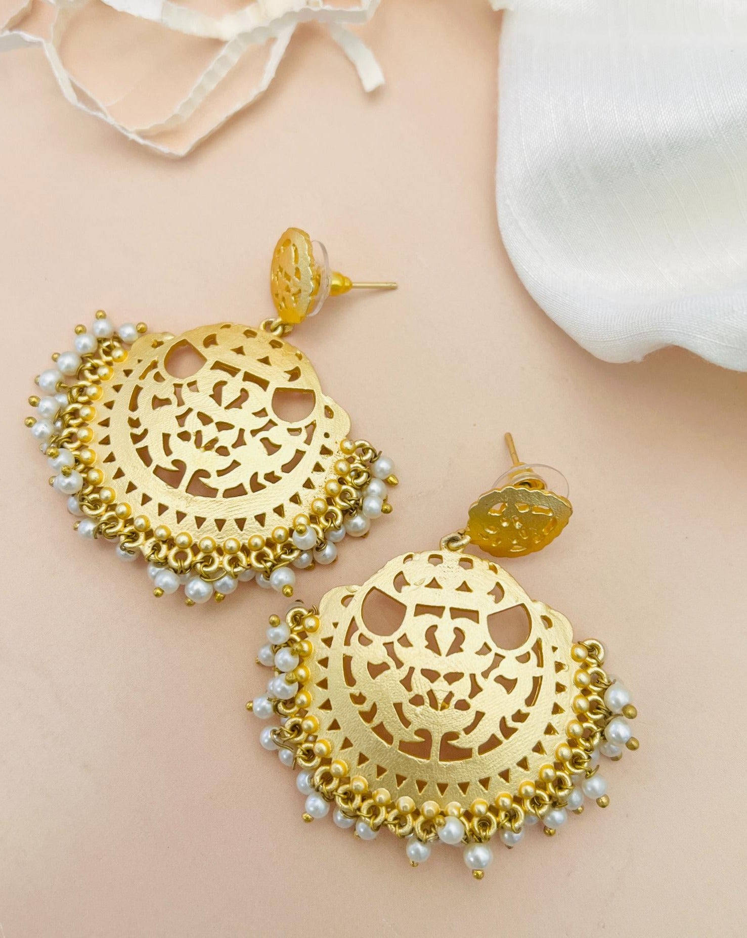 Matt Gold Plated Baroque Pearl Earrings by Abdesignsjewellery with intricate cutout design and pearl detailing