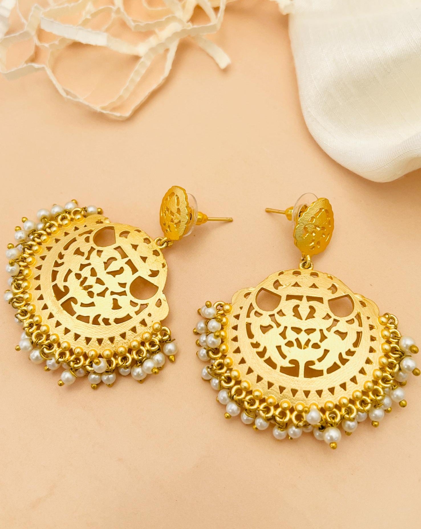 Matt Gold Plated Baroque Pearl Earrings by Abdesignsjewellery with intricate cutout design and pearl accents