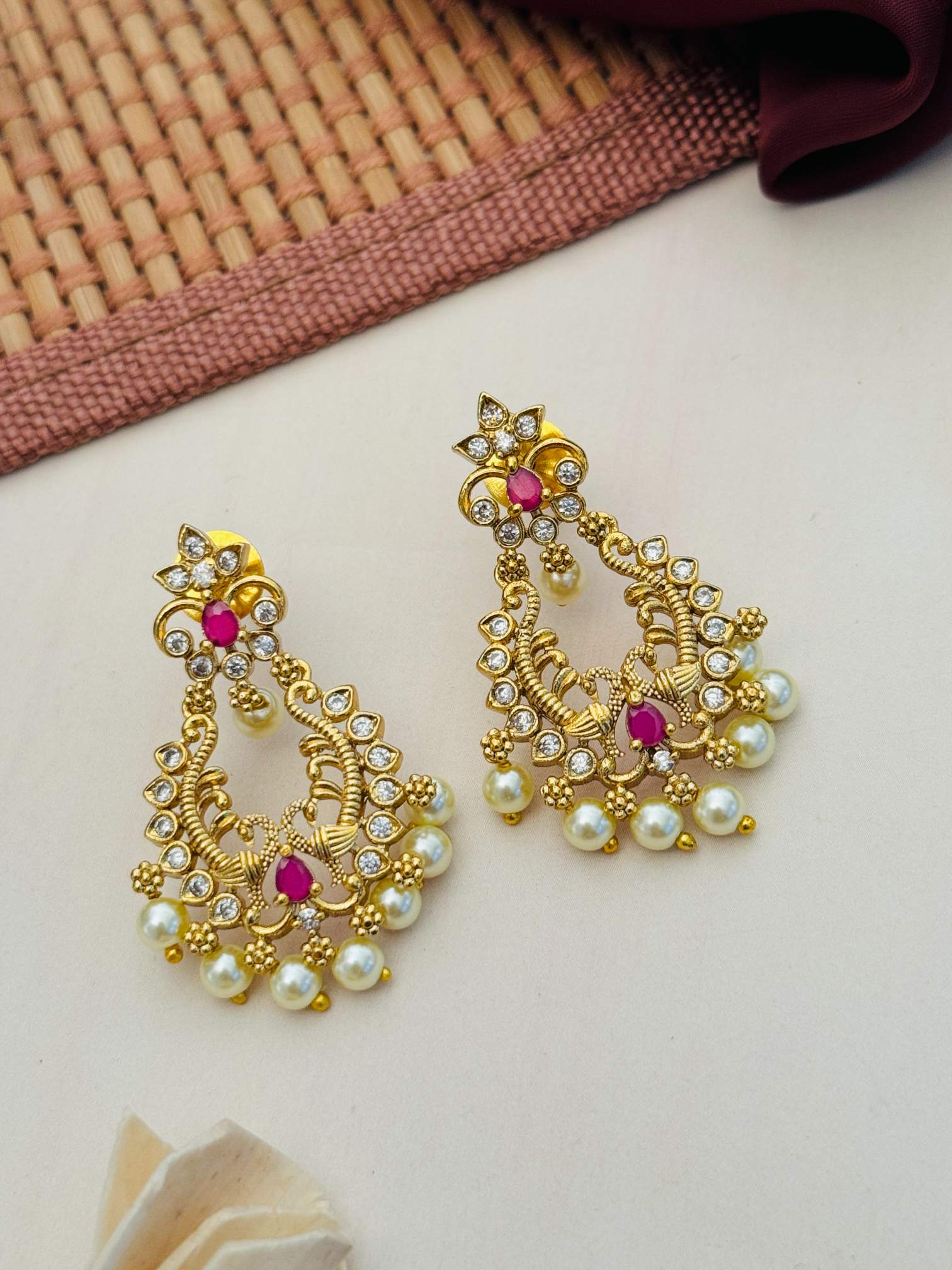 Matt Gold Plated Temple Necklace Set featuring intricate gold design with red stones and pearl accents