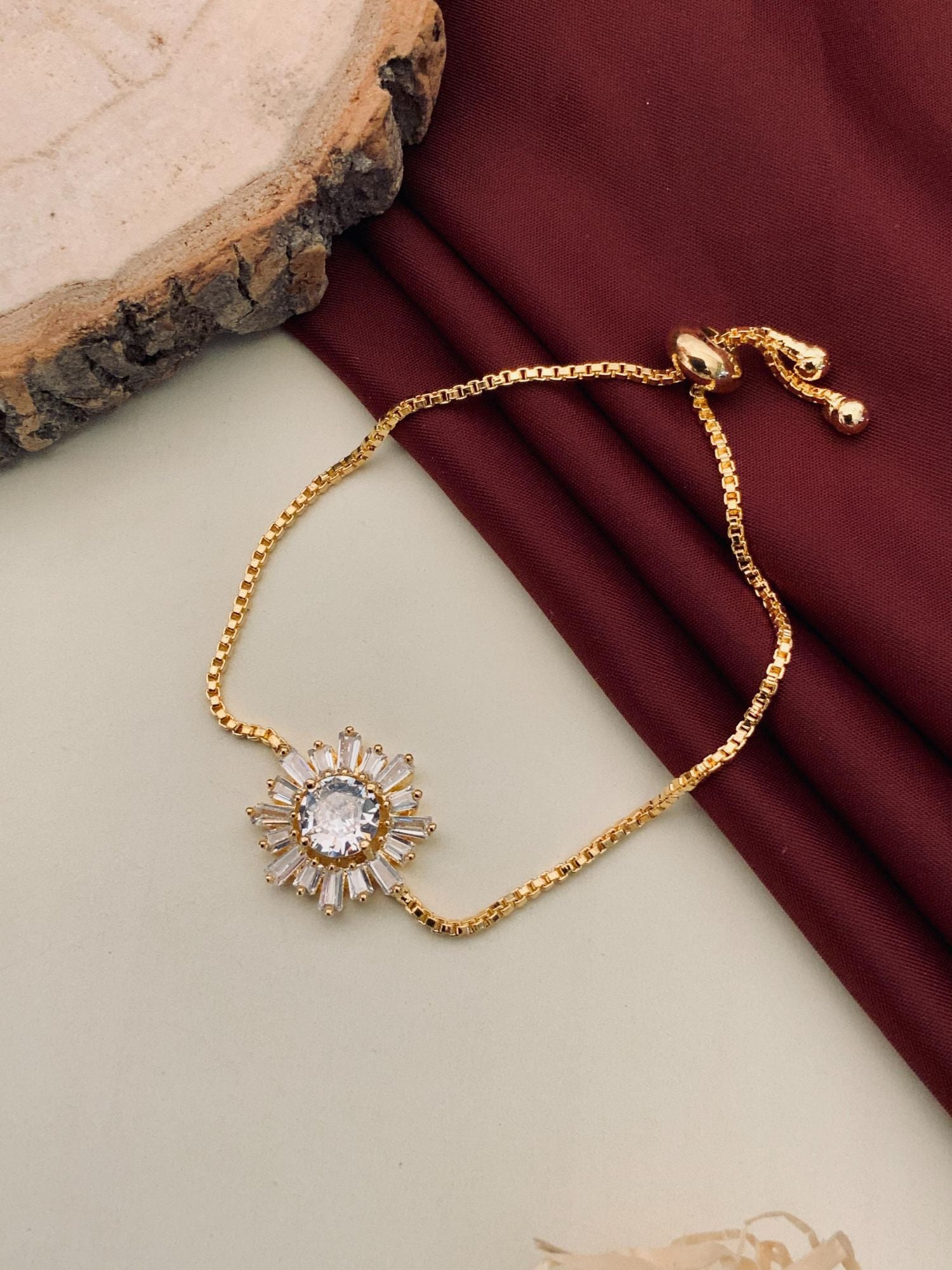 Abdesignsjewellery minimal gold plated bracelet with adjustable slider chain and sunburst crystal centerpiece