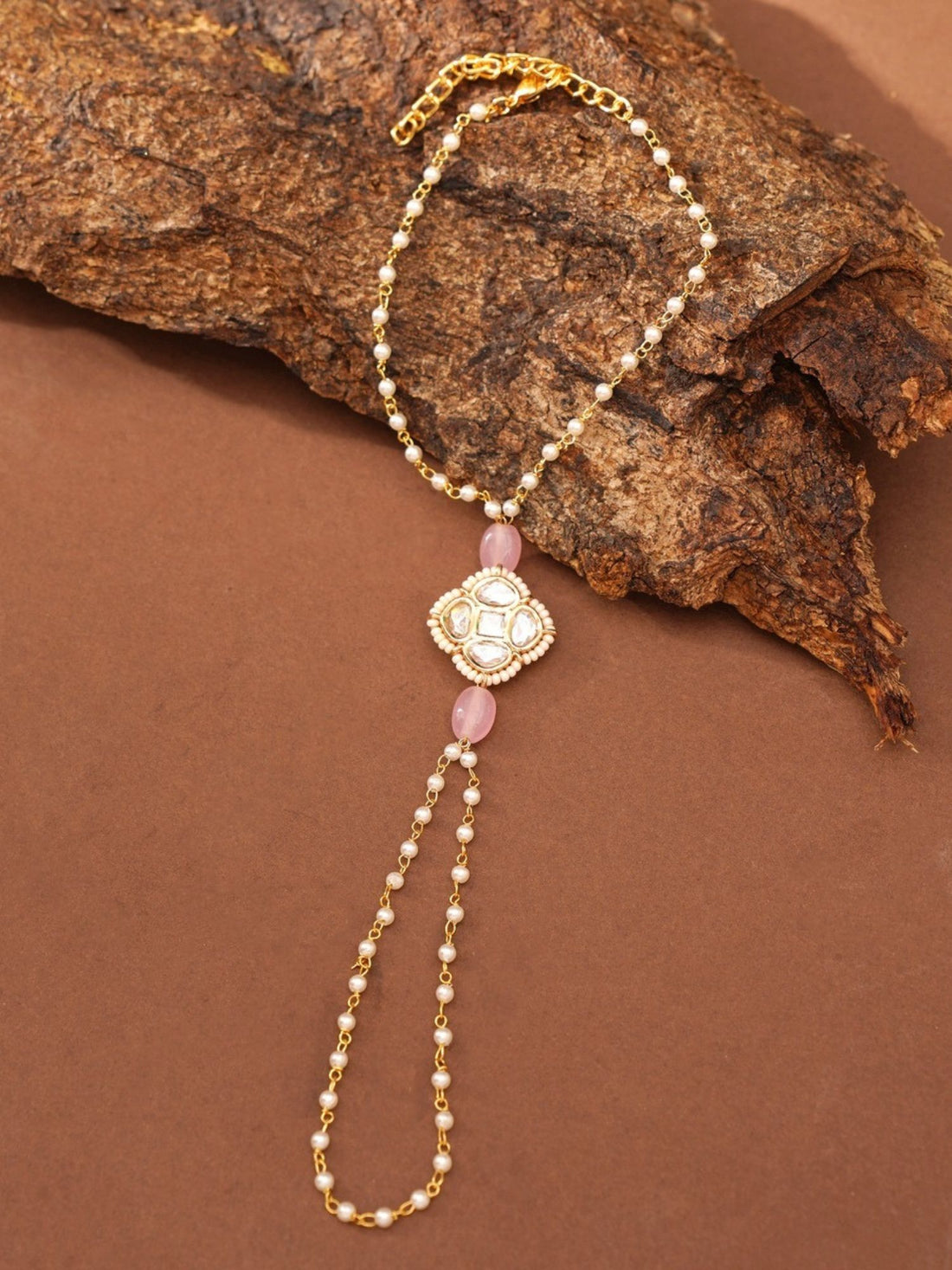 Abdesignsjewellery minimal gold plated hand pocha bracelet with beaded chain pink stones and floral centerpiece