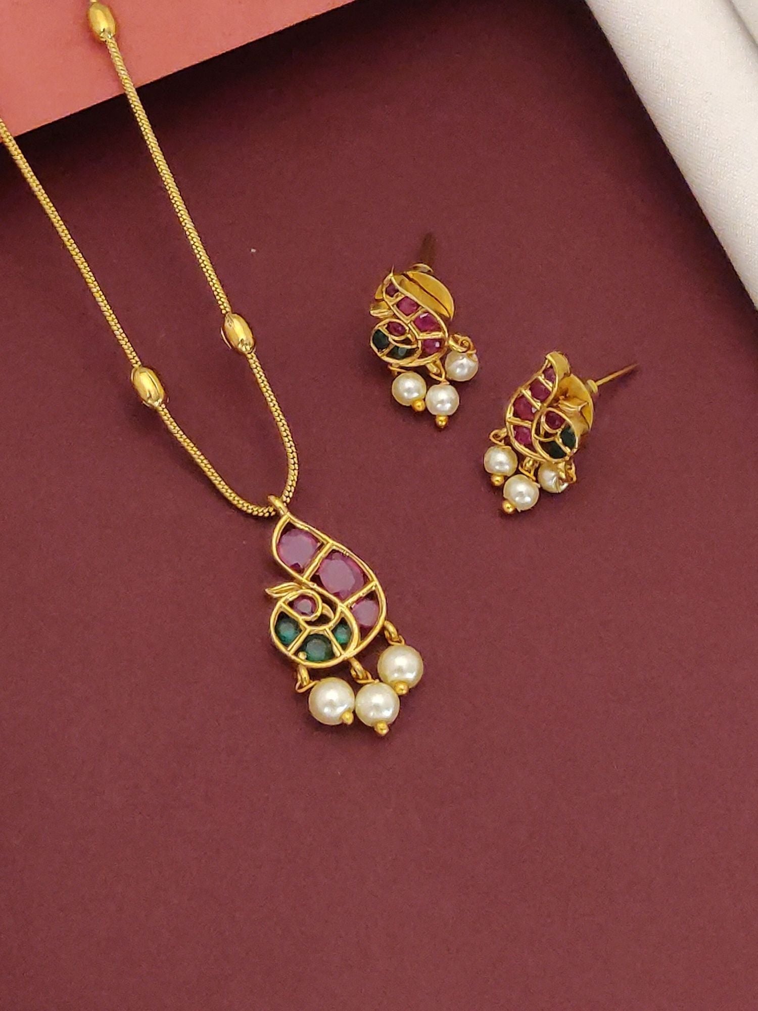 Minimal Gold Plated Kemp Stone Peacock Necklace Set with gold peacock pendant kemp stones pearl drops and matching earrings