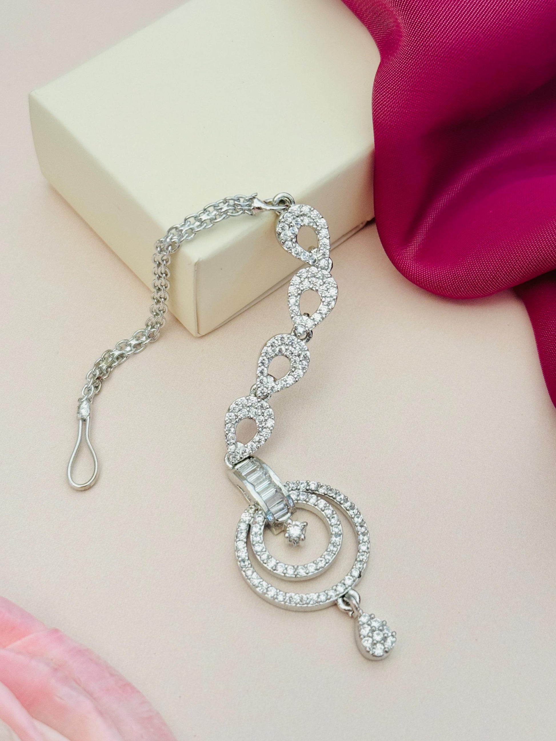 Minimalist Silver Plated American Diamond Maangtikka with delicate circular design by Abdesignsjewellery