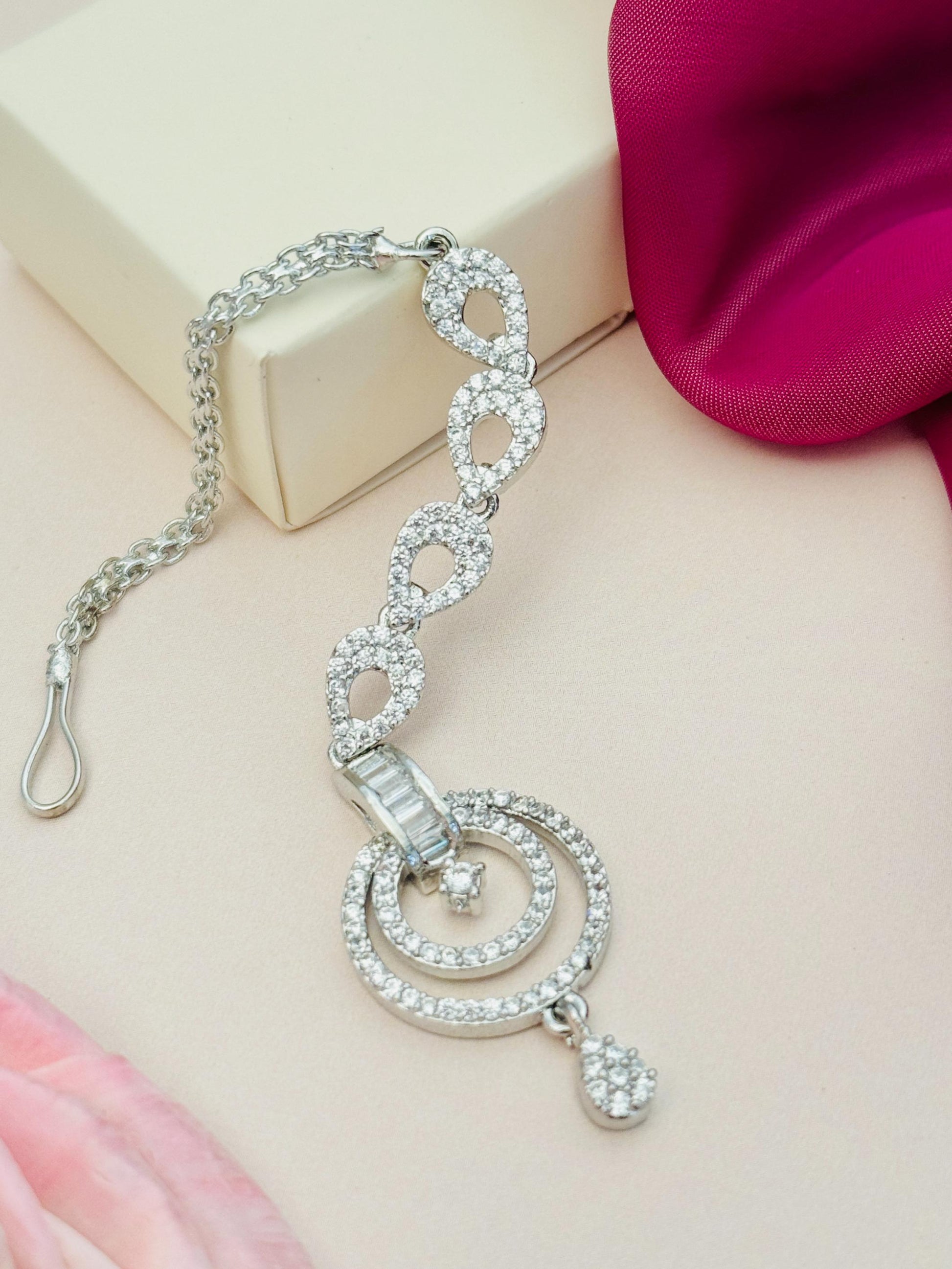 Minimalist Silver Plated American Diamond Maangtikka with intricate circular and chain design