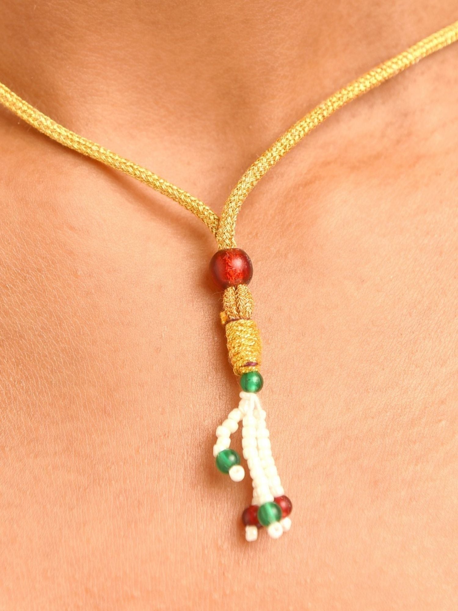 Abdesignsjewellery gold cord necklace with red bead and green white beaded tassel multicolor polki necklace set for women