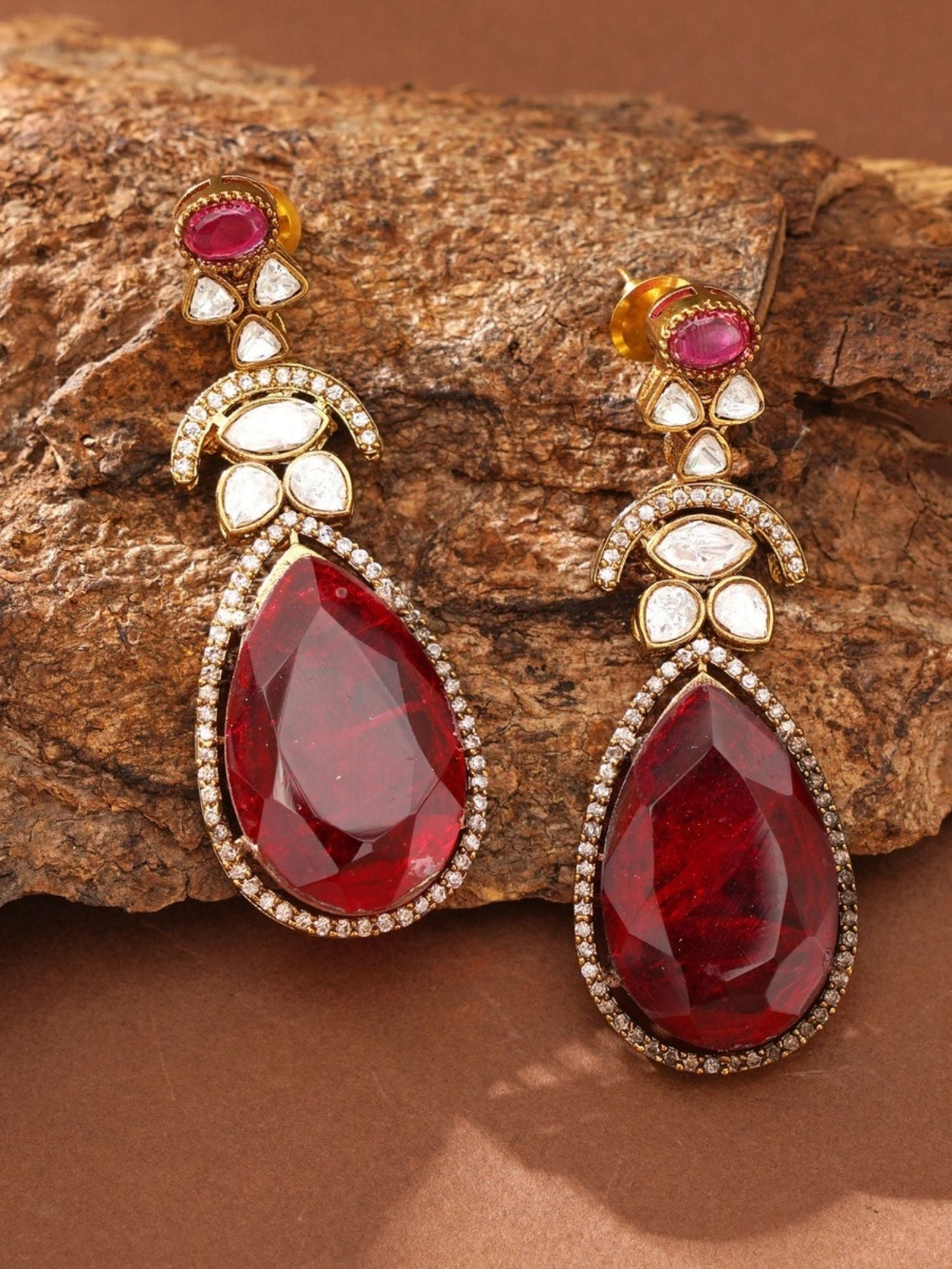 Abdesignsjewellery multicolor polki necklace set for women shown with red teardrop polki earrings and gold white stone accents