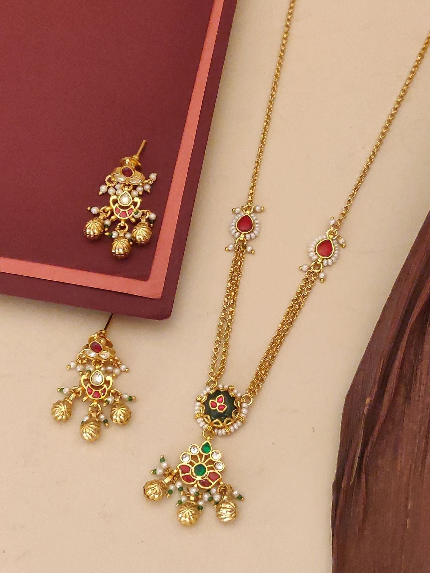 Abdesignsjewellery gold pearl and gemstone pendant chain with red and green stones and matching jhumka earrings