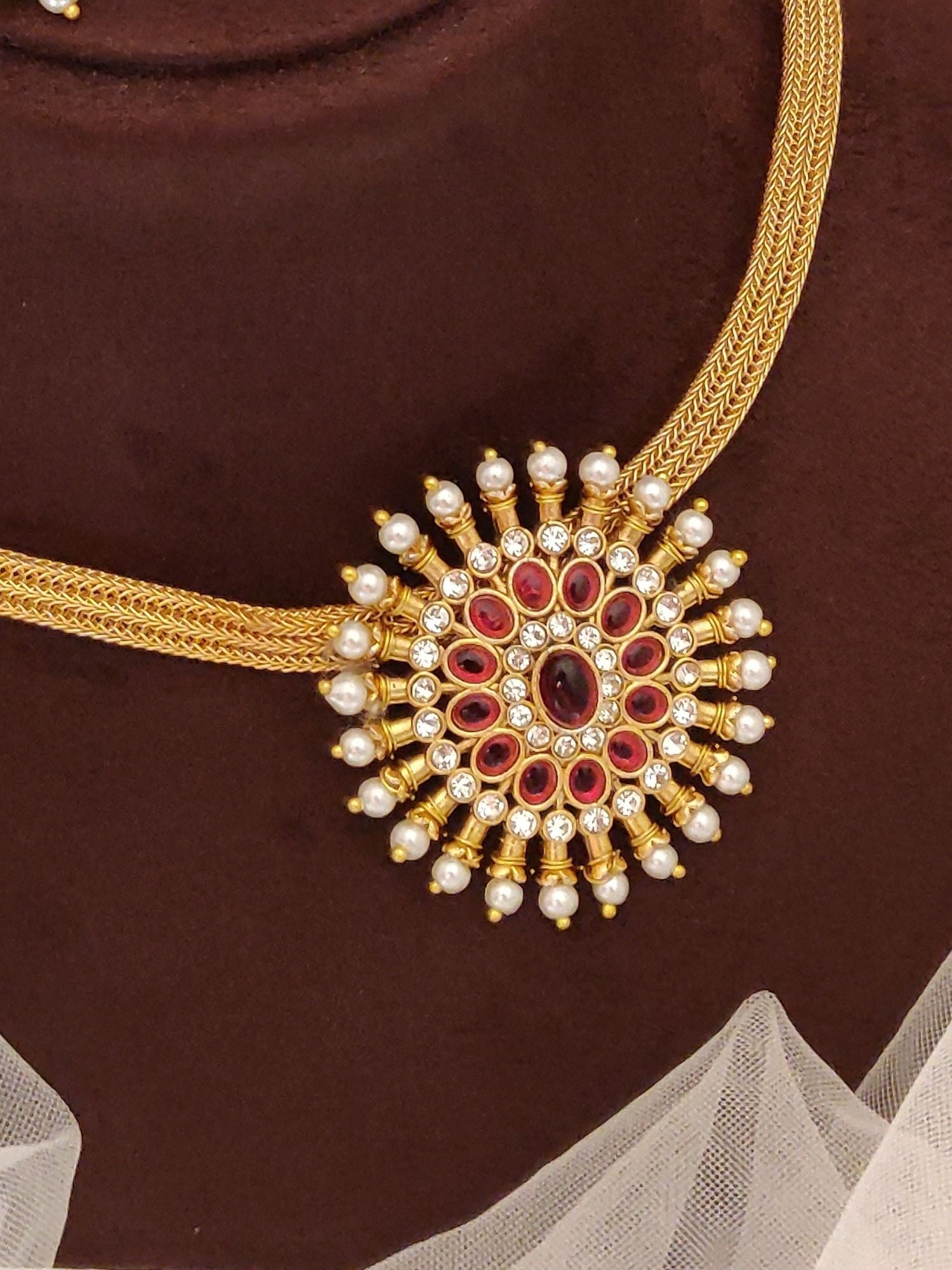 Abdesignsjewellery gold pendents chain with circular pearl and green stone pendant set and red center gems