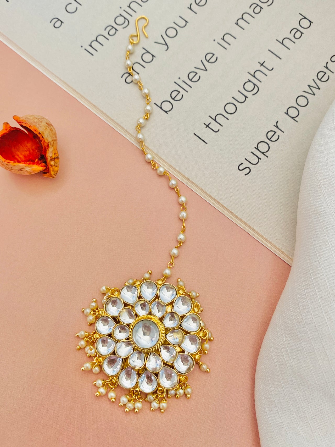 Polki Kundan Maangtikka by Abdesignsjewellery featuring intricate gold and white stone floral design with pearl accents