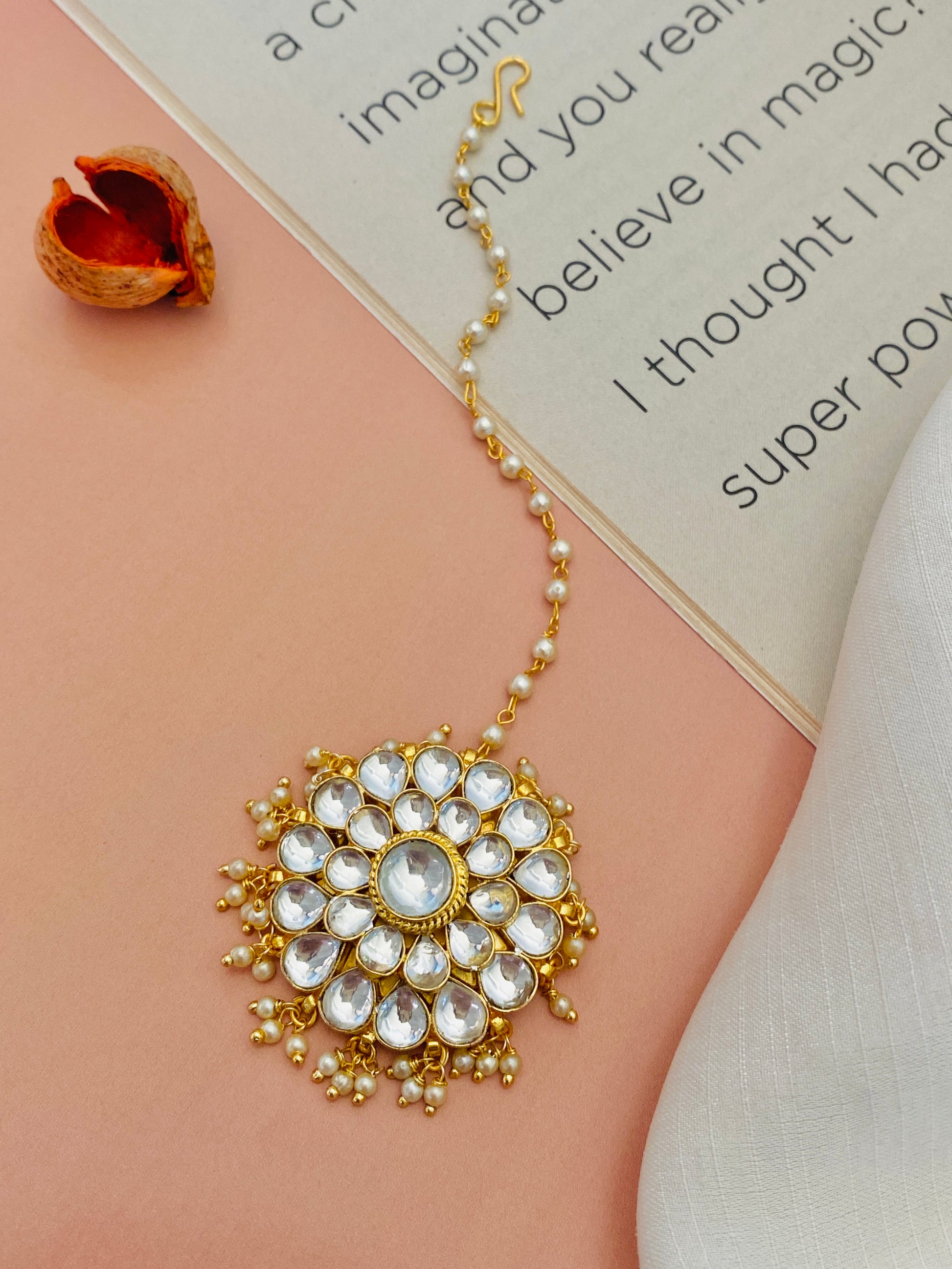 Polki Kundan Maangtikka by Abdesignsjewellery featuring gold finish with white stone embellishments