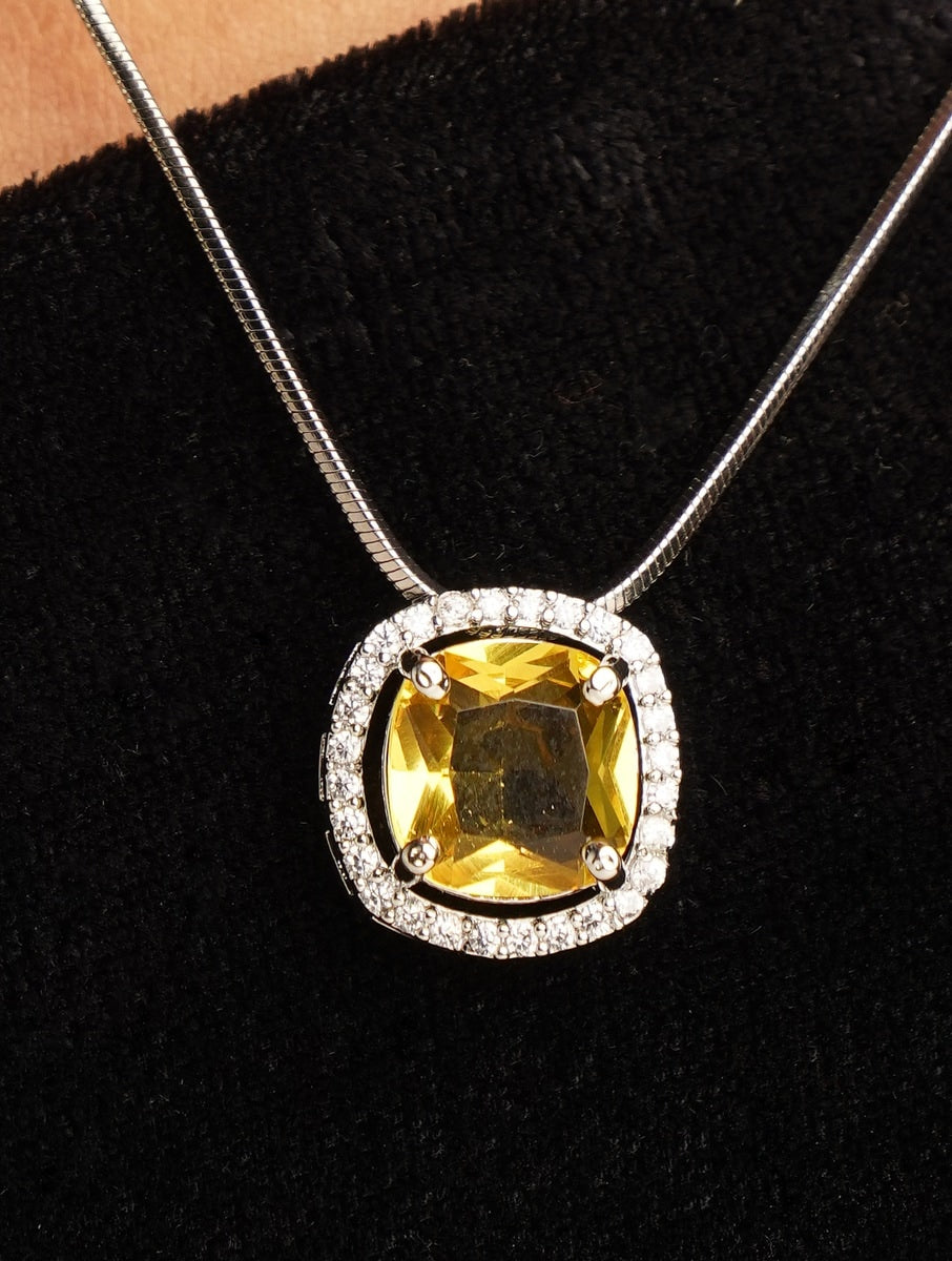 Precious Silver Plated Cz Pendant Chain Combo necklace worn by woman with matching yellow stone earrings and ring