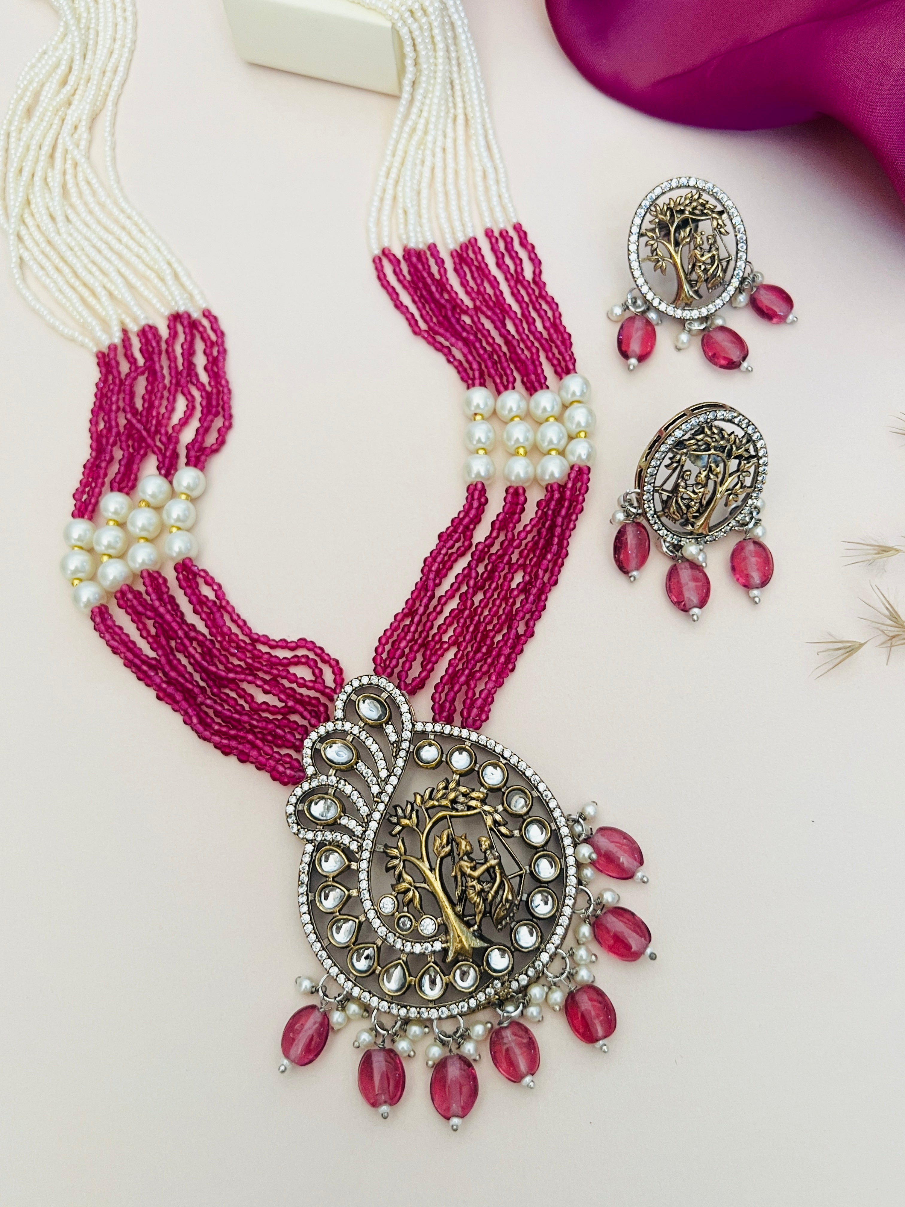 Radha Krishna Temple Beaded Mala Necklace Set with white and pink beads and detailed pendant from Abdesignsjewellery