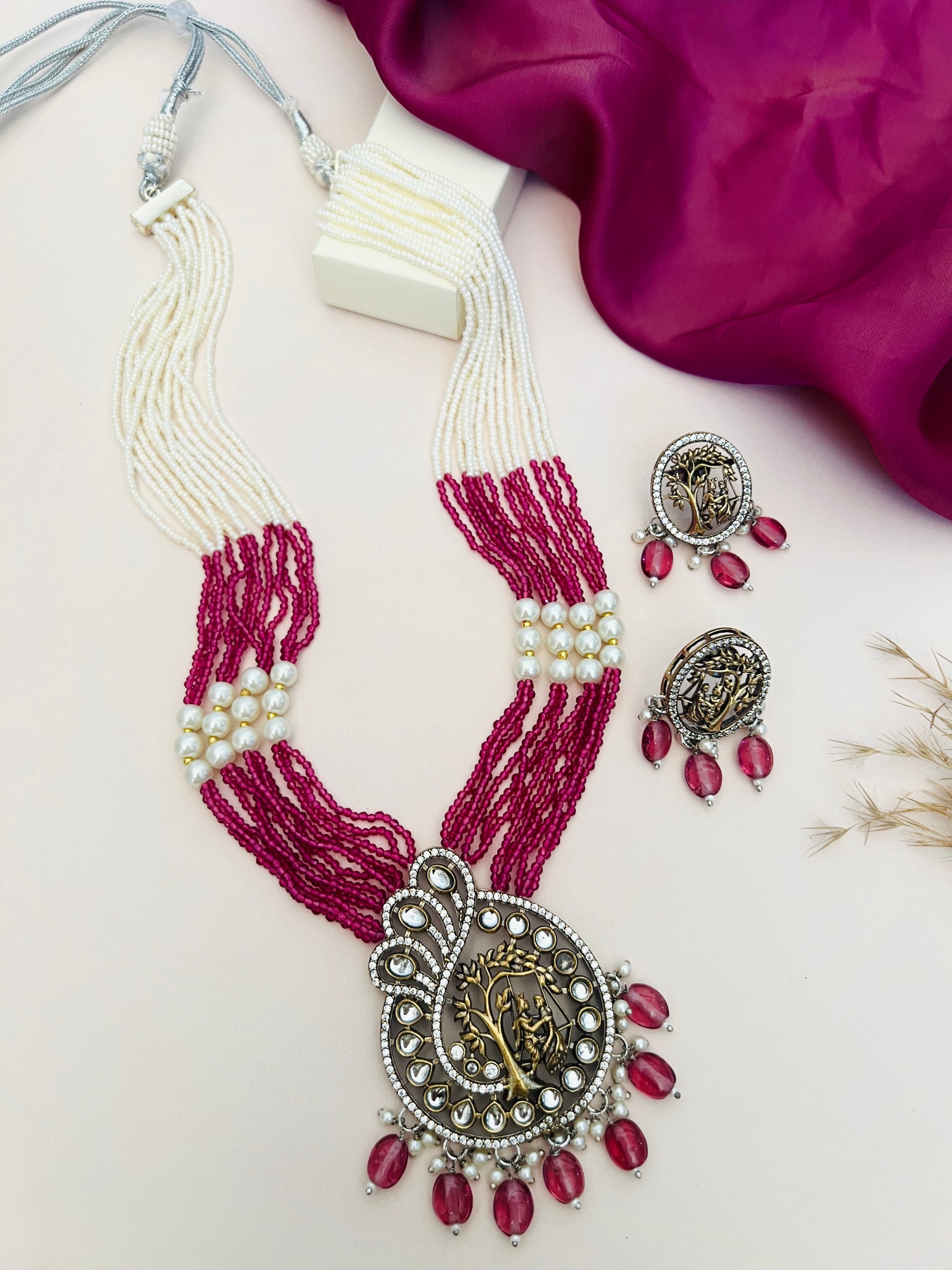 Radha Krishna Temple Beaded Mala Necklace Set with red and white beads and intricate pendant by Abdesignsjewellery
