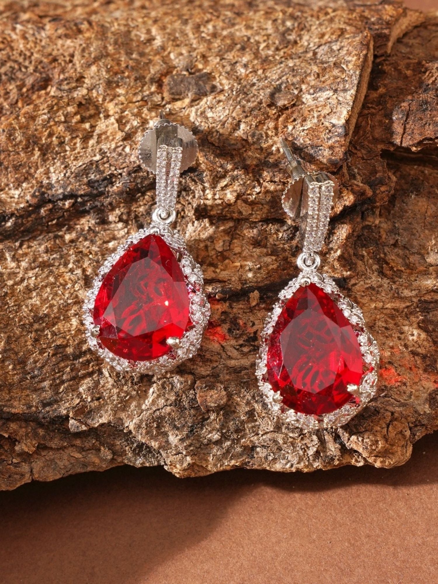 Abdesignsjewellery red drop earrings for women with teardrop red crystals and pave silver halo settings