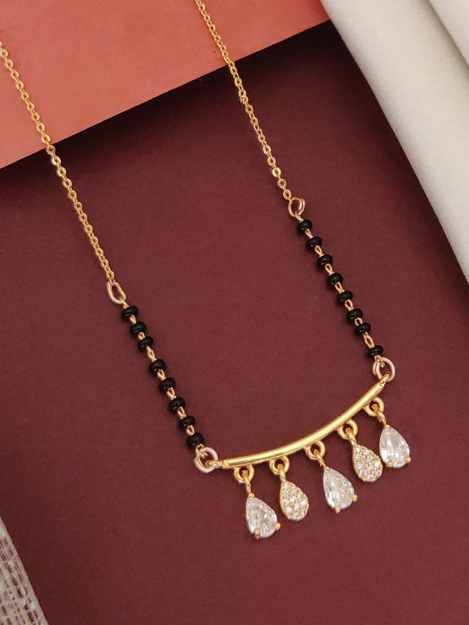 Abdesigns Rose Gold Plated Black Beads Mangalsutra with Teardrop Pendants for Elegant Style