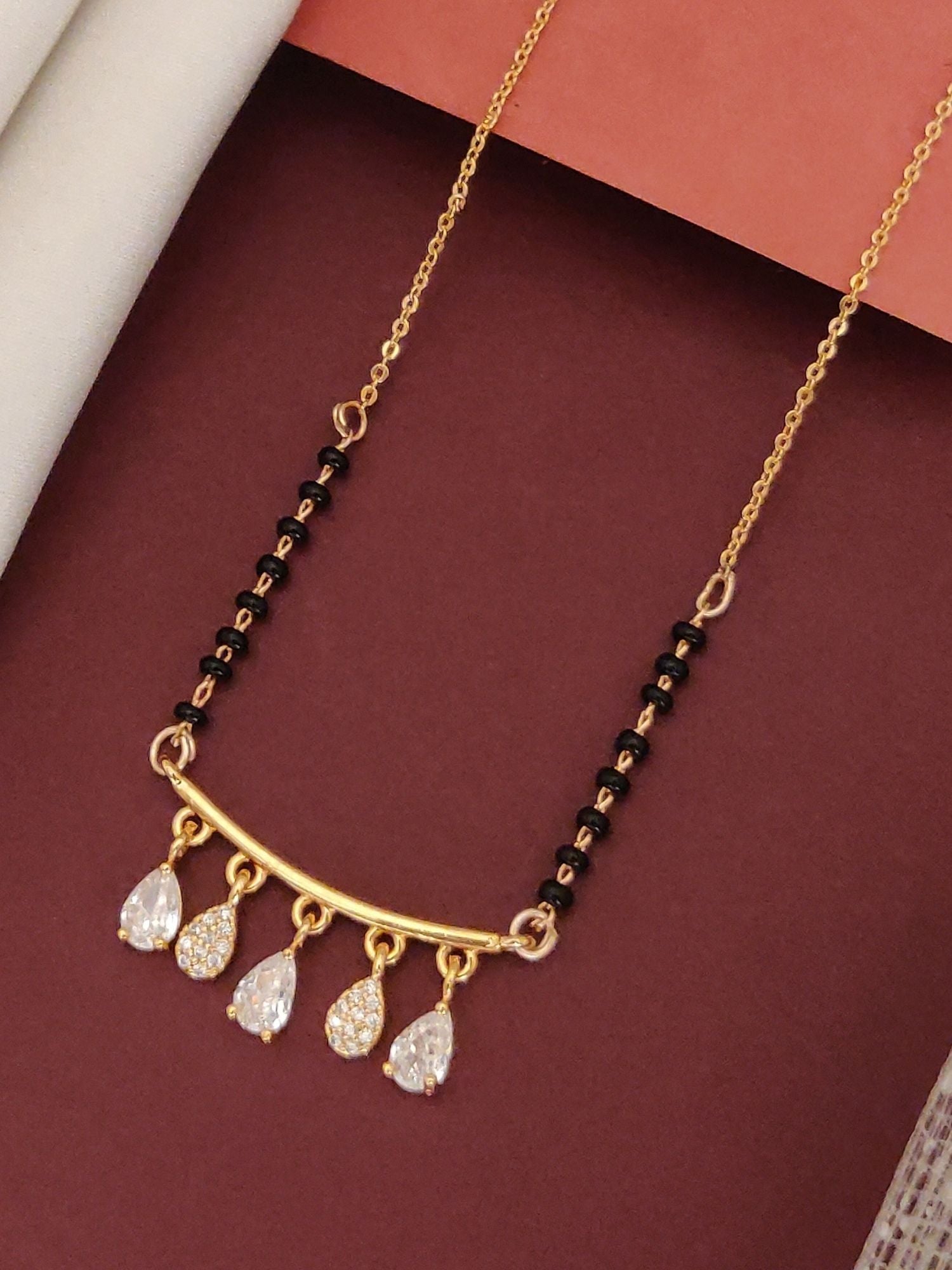 Abdesigns Rose Gold Plated Black Beads Mangalsutra with Five Elegant Teardrop Pendants