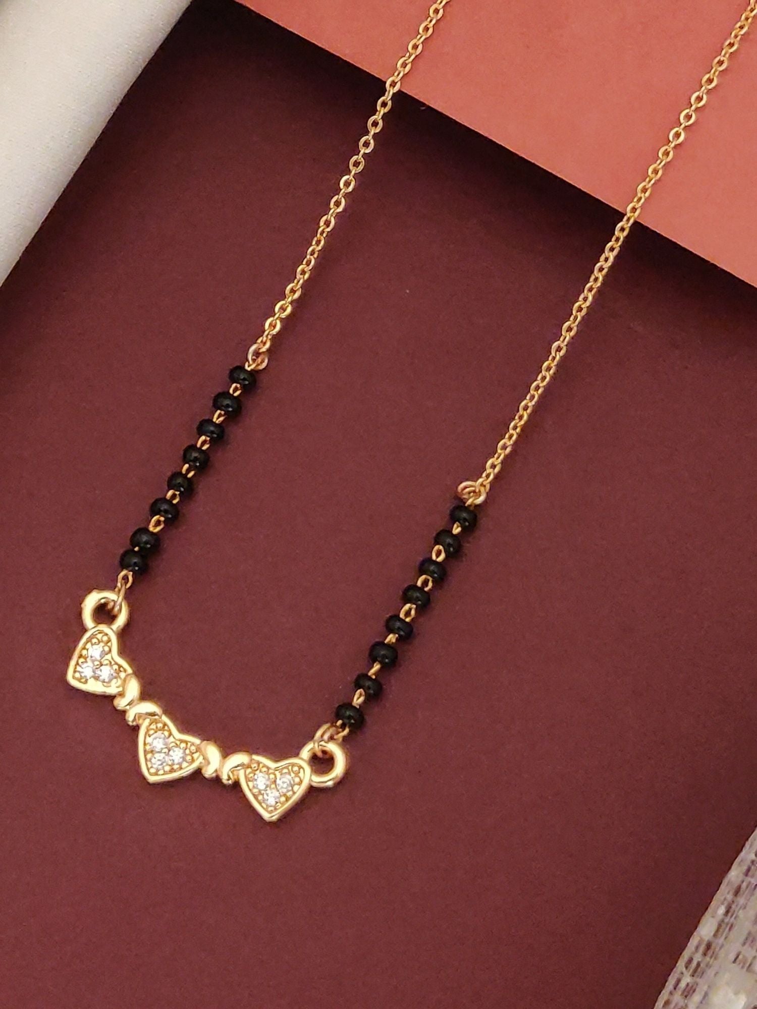 Abdesigns Rose Gold Plated Black Beads Mangalsutra with heart-shaped pendant and elegant design