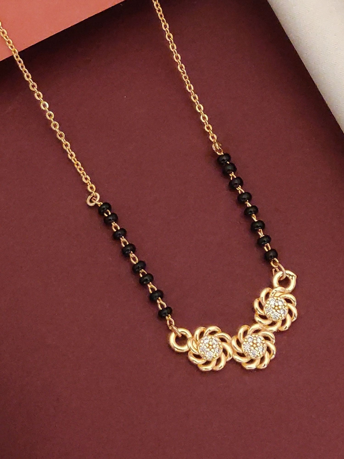 Elegant Rose Gold Plated Black Beads Mangalsutra with three decorative pendants