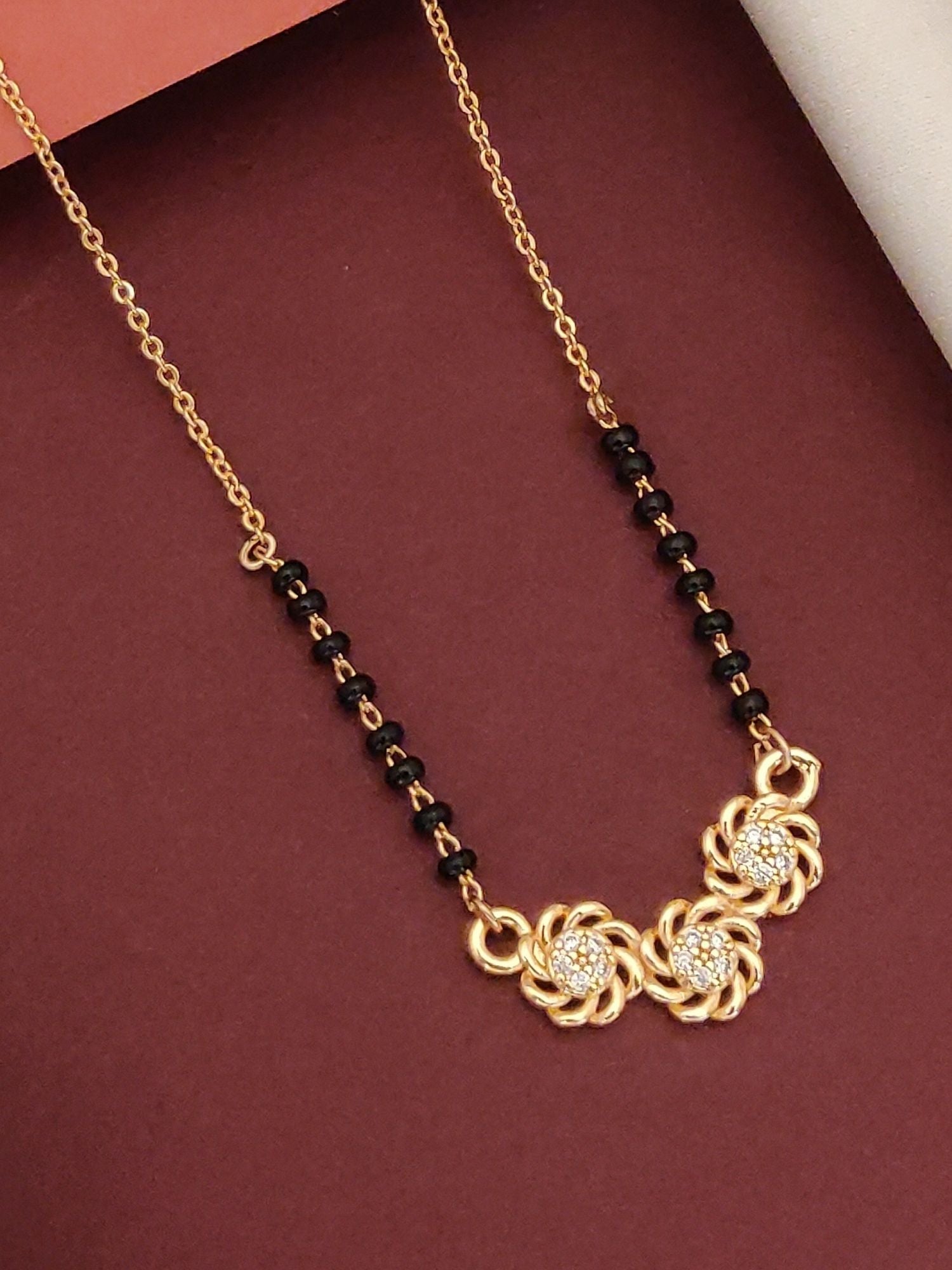 Elegant Rose Gold Plated Black Beads Mangalsutra with three decorative pendants