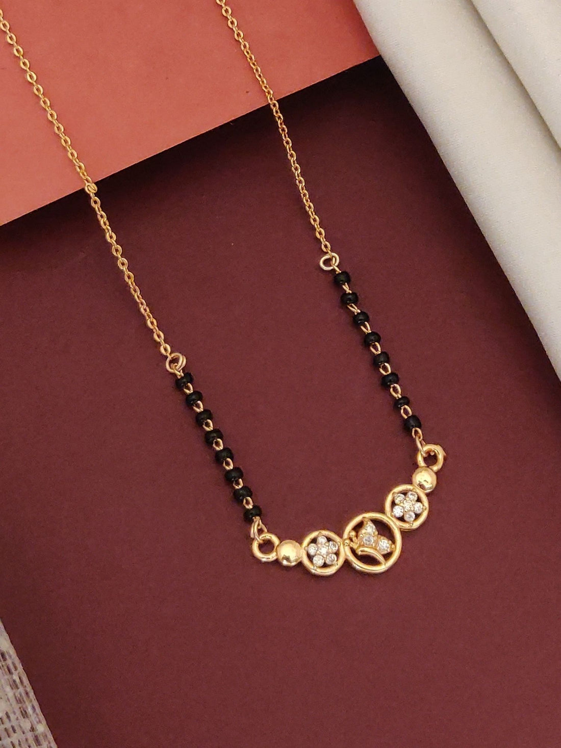 Abdesigns Rose Gold Plated Black Beads Mangalsutra with Elegant Design and Shiny Accents