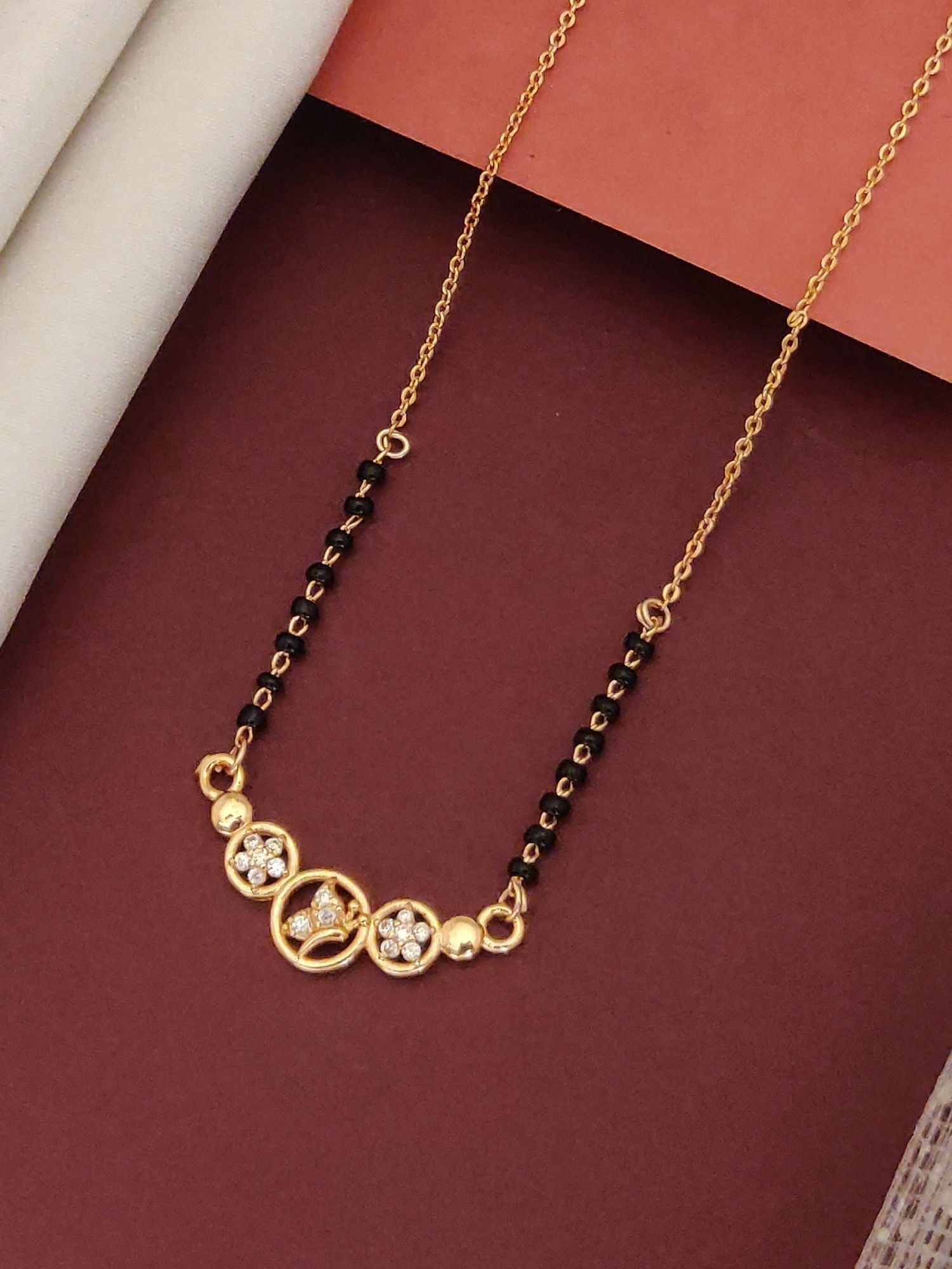 Abdesigns Rose Gold Plated Black Beads Mangalsutra with Elegant Gemstone Detailing
