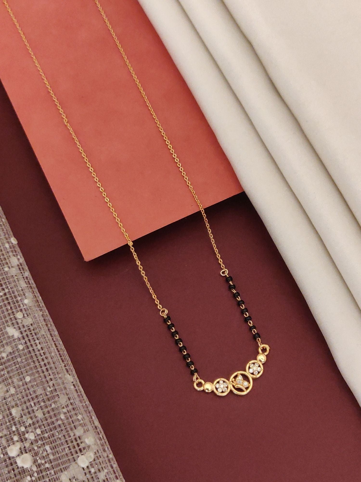 Abdesigns Rose Gold Plated Black Beads Mangalsutra with Elegant Design and Shiny Accents