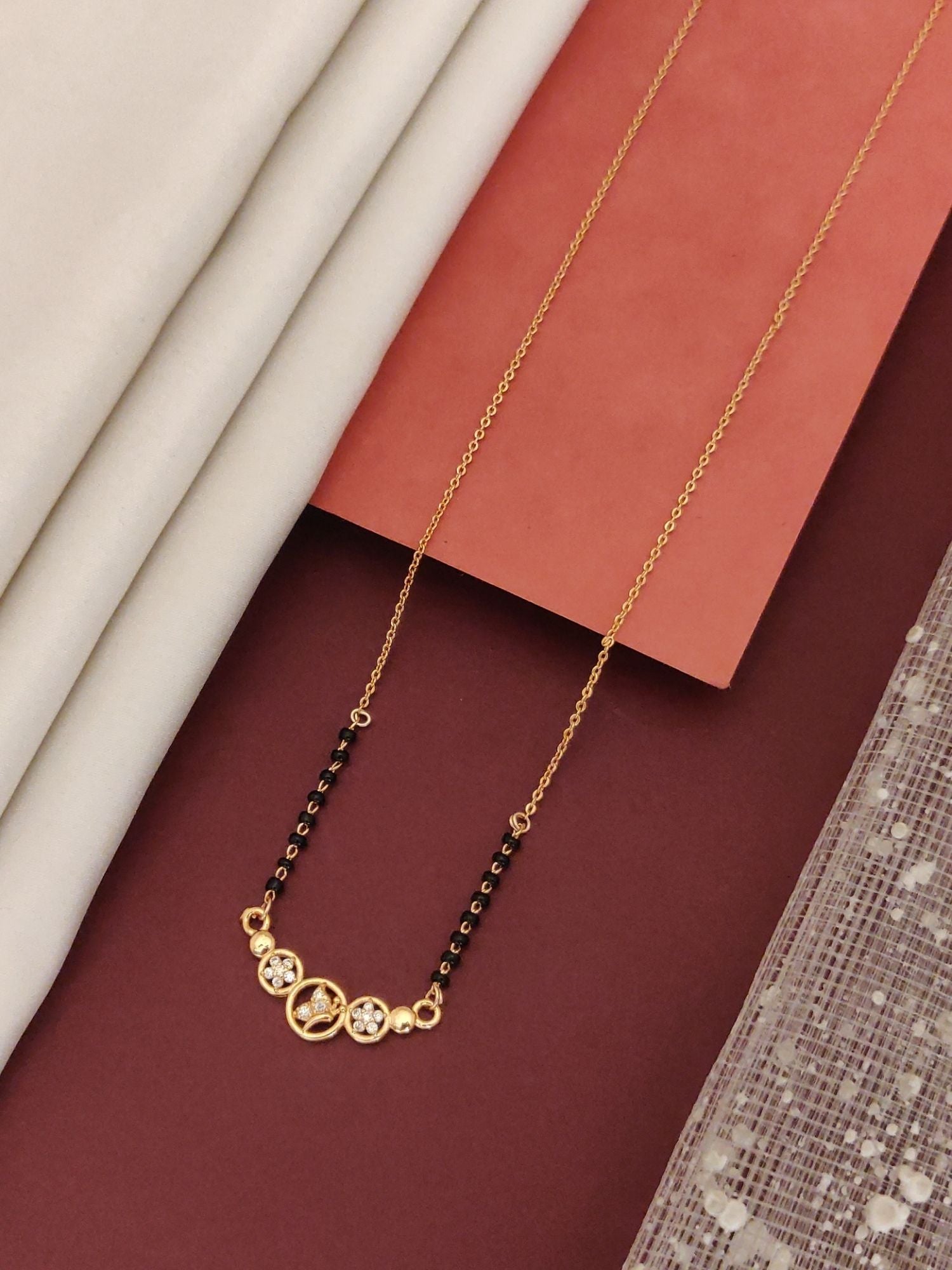 Abdesigns Rose Gold Plated Black Beads Mangalsutra with elegant design and sparkling accents