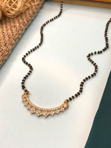 Abdesignsjewellery rose gold plated mangalsutra with black beads and crescent pave pendant studded with crystals