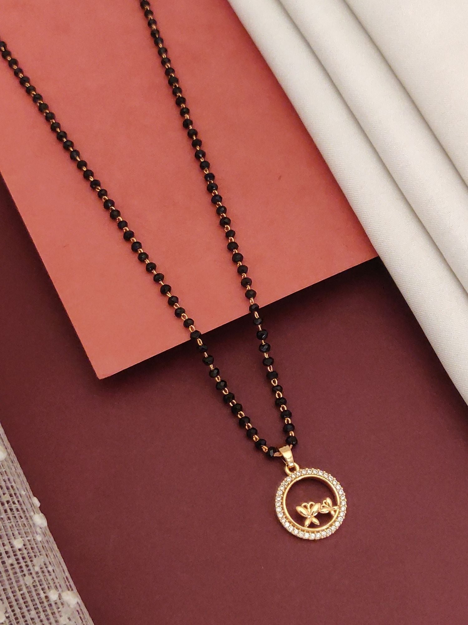 Abdesignsjewellery rosegold flower mangalsutra for women black bead chain with circular pendant