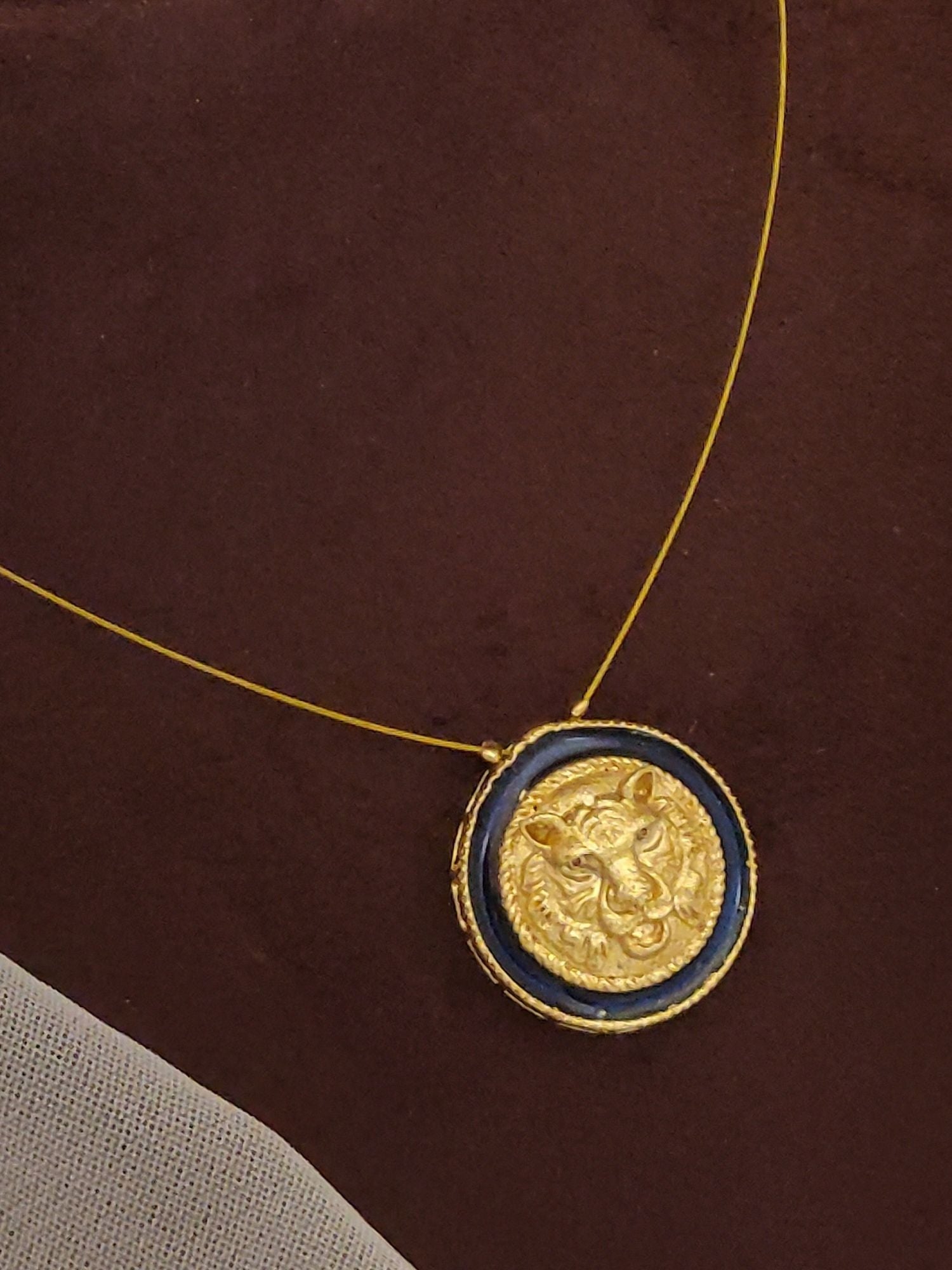 Sabyasachi inspired necklace earrings set gold round lion pendant on thin gold chain with blue border by Abdesignsjewellery