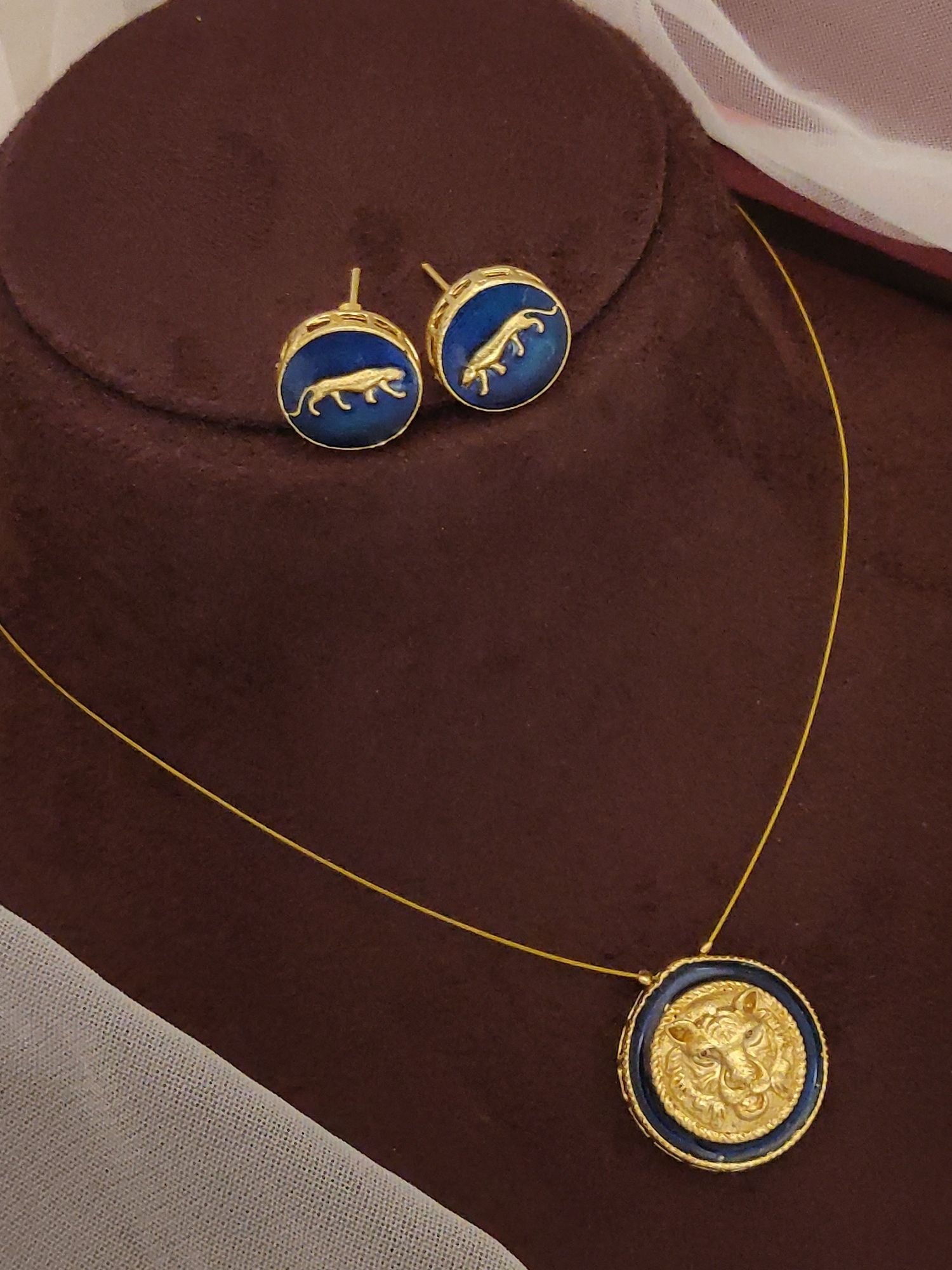Gold pendant chain with navy enamel medallion and matching stud earrings Sabyasachi inspired necklace earrings set