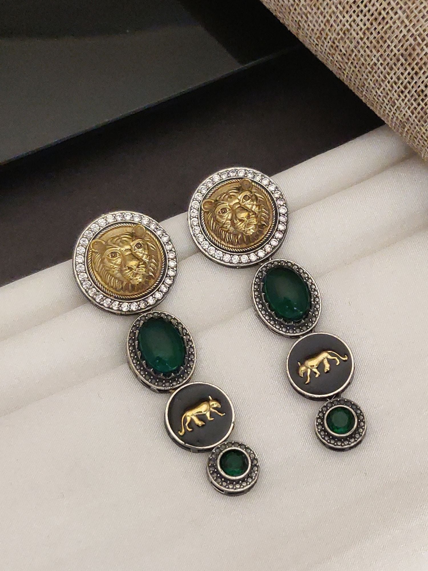 Sabyasachi inspired silver earrings long drop with gold lion medallions green stones and crystal borders