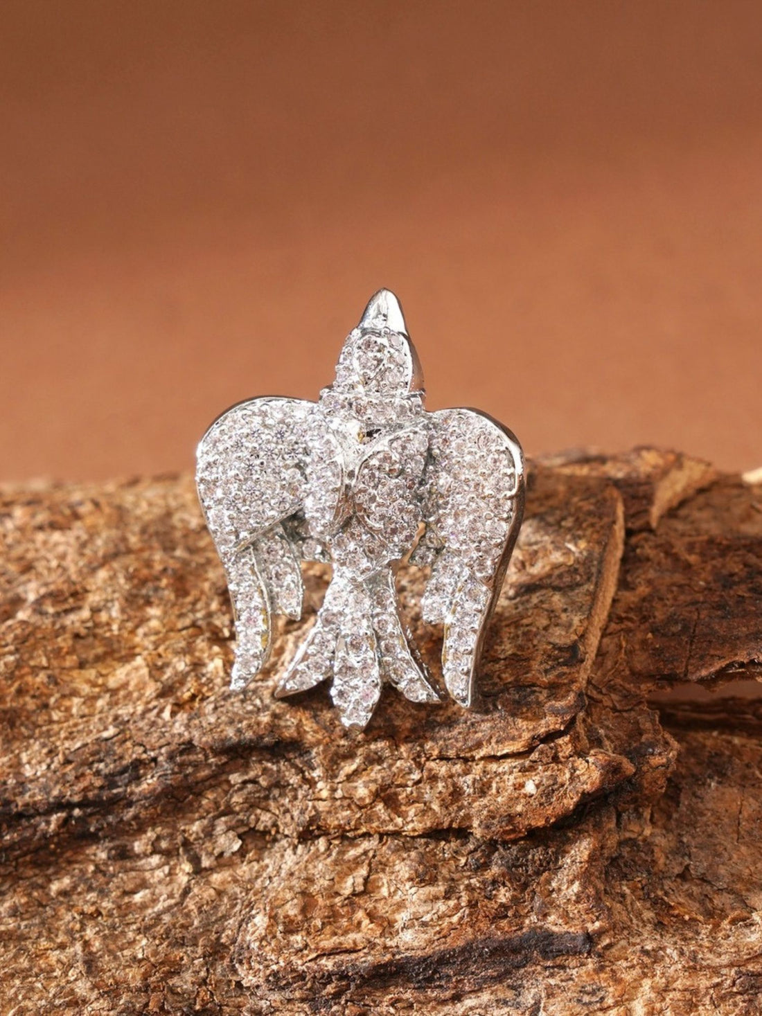 Close up of silver plated American diamond bird ring on hand sparkling pave bird design by Abdesignsjewellery