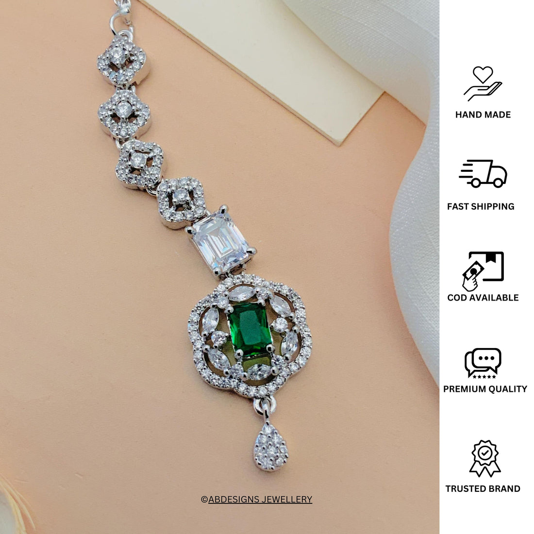 Silver Plated American Diamond Maangtikka worn on forehead with red center stone by Abdesignsjewellery