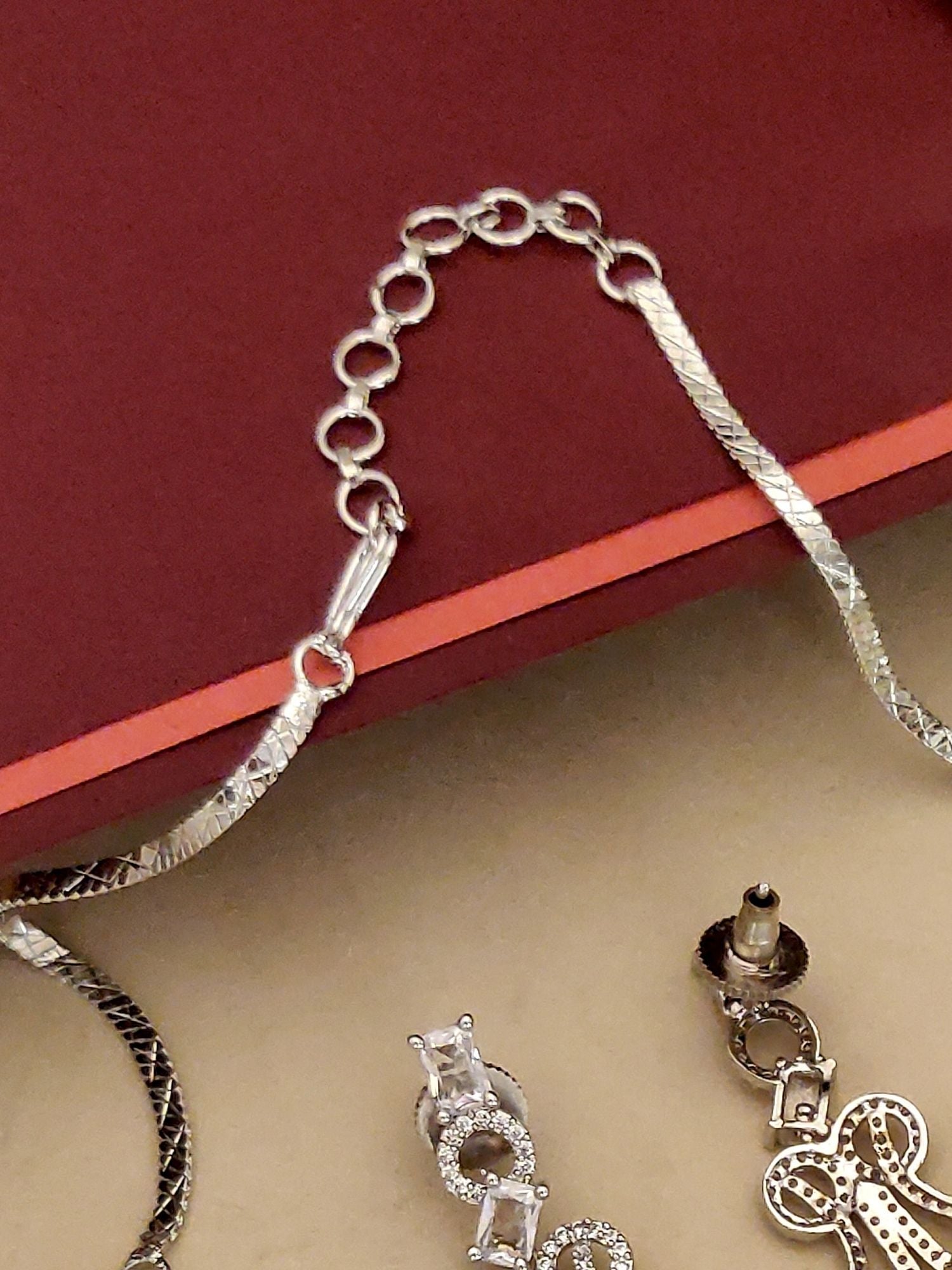 Abdesignsjewellery silver plated american diamond necklace set close up showing chain extender clasp and matching earrings