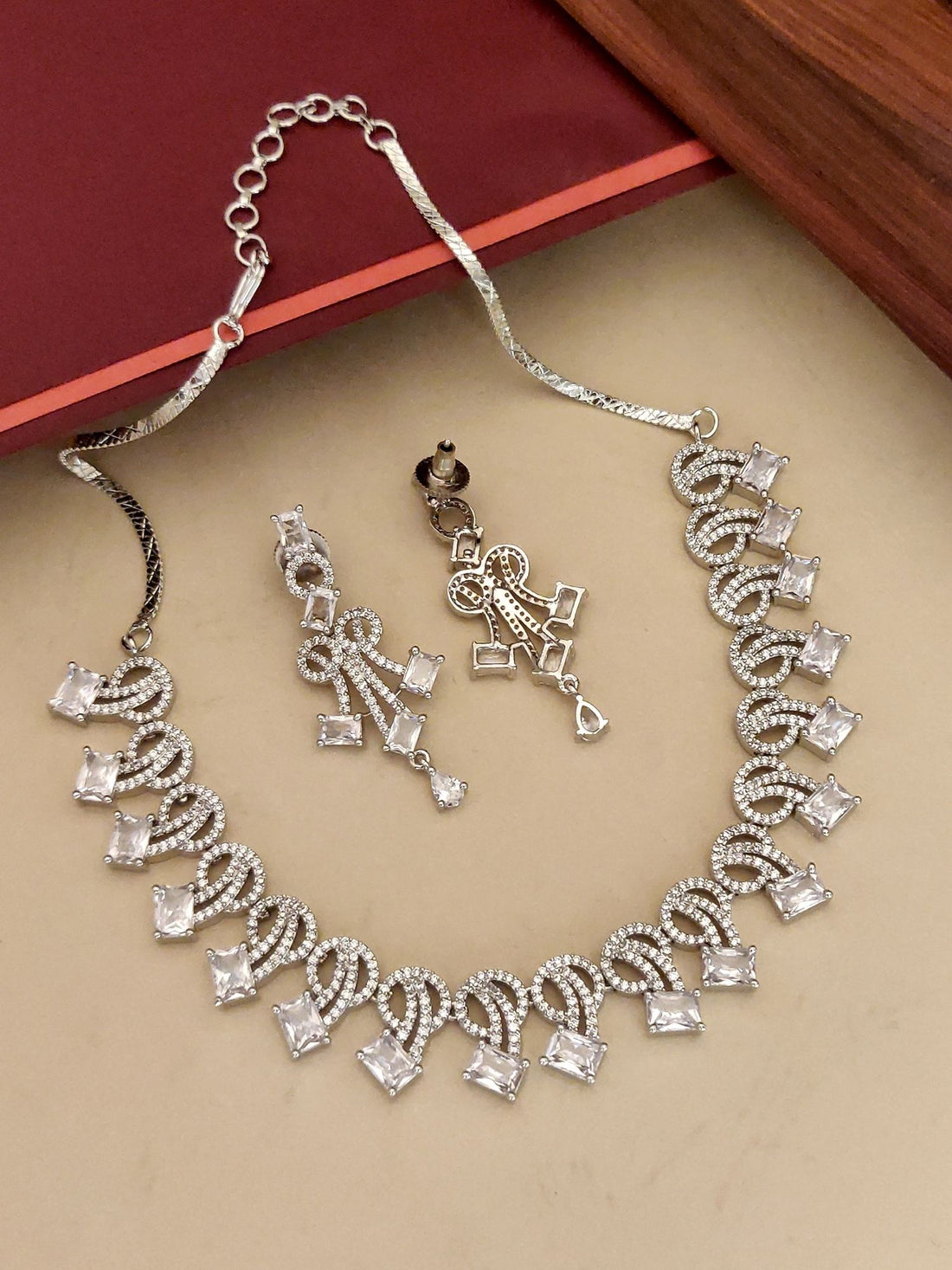 silver plated american diamond necklace set with matching dangling earrings in square stone loop design
