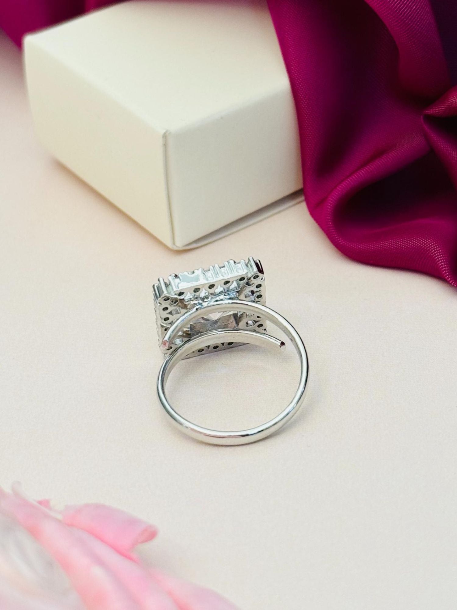 Abdesignsjewellery silver plated American diamond square ring with ornate square basket setting on display box