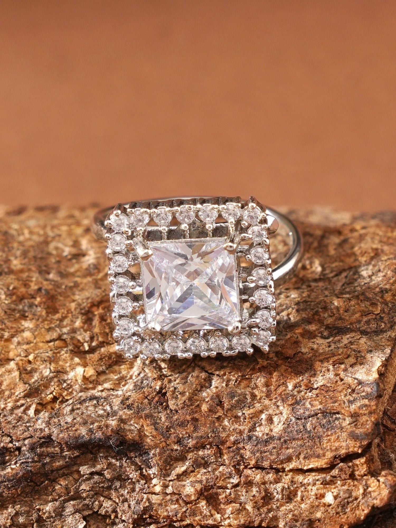 Abdesignsjewellery silver plated American diamond square ring with central princess cut and halo setting on polished band