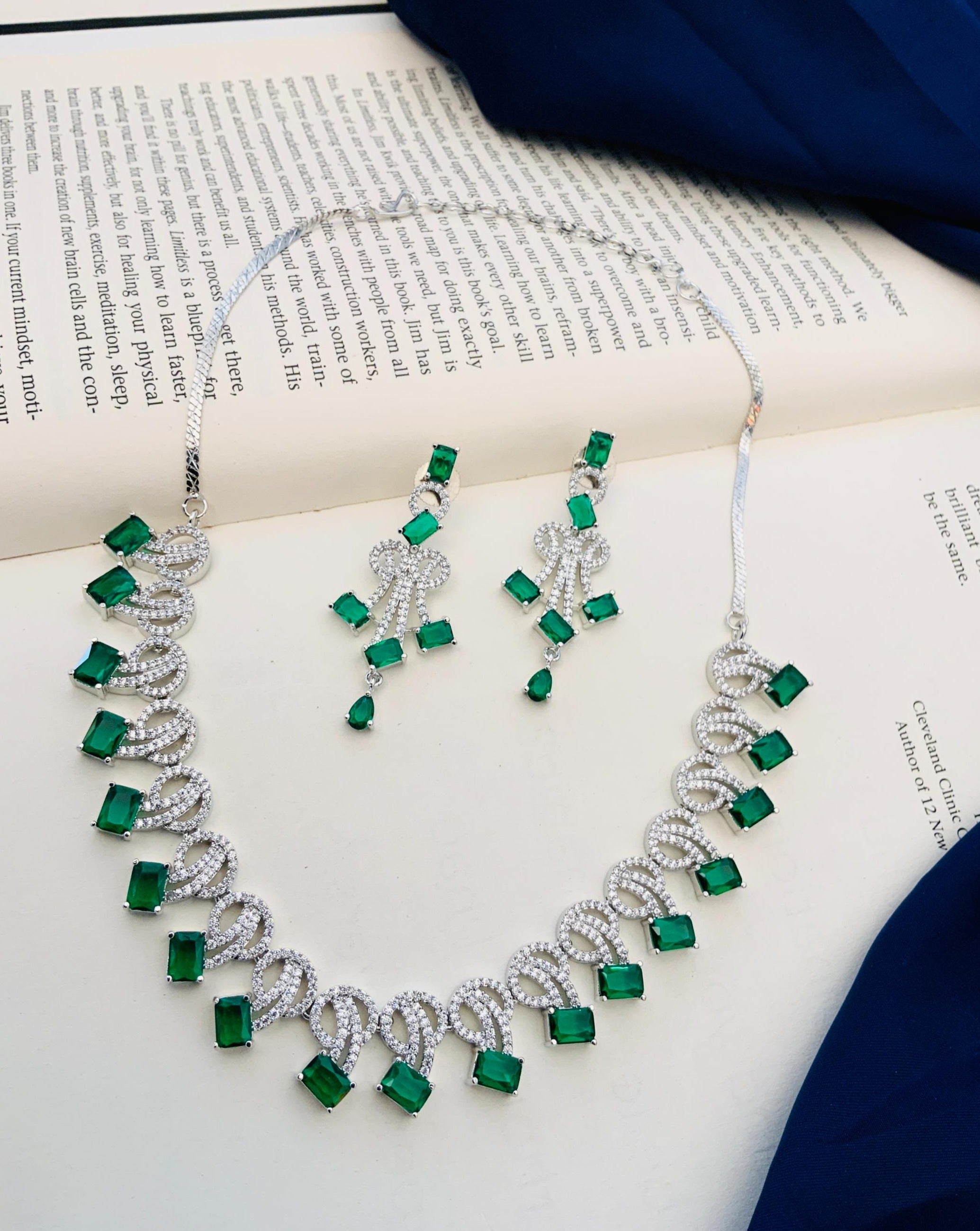 Silver plated blue American diamond necklace set featuring green stones and intricate design by Abdesignsjewellery