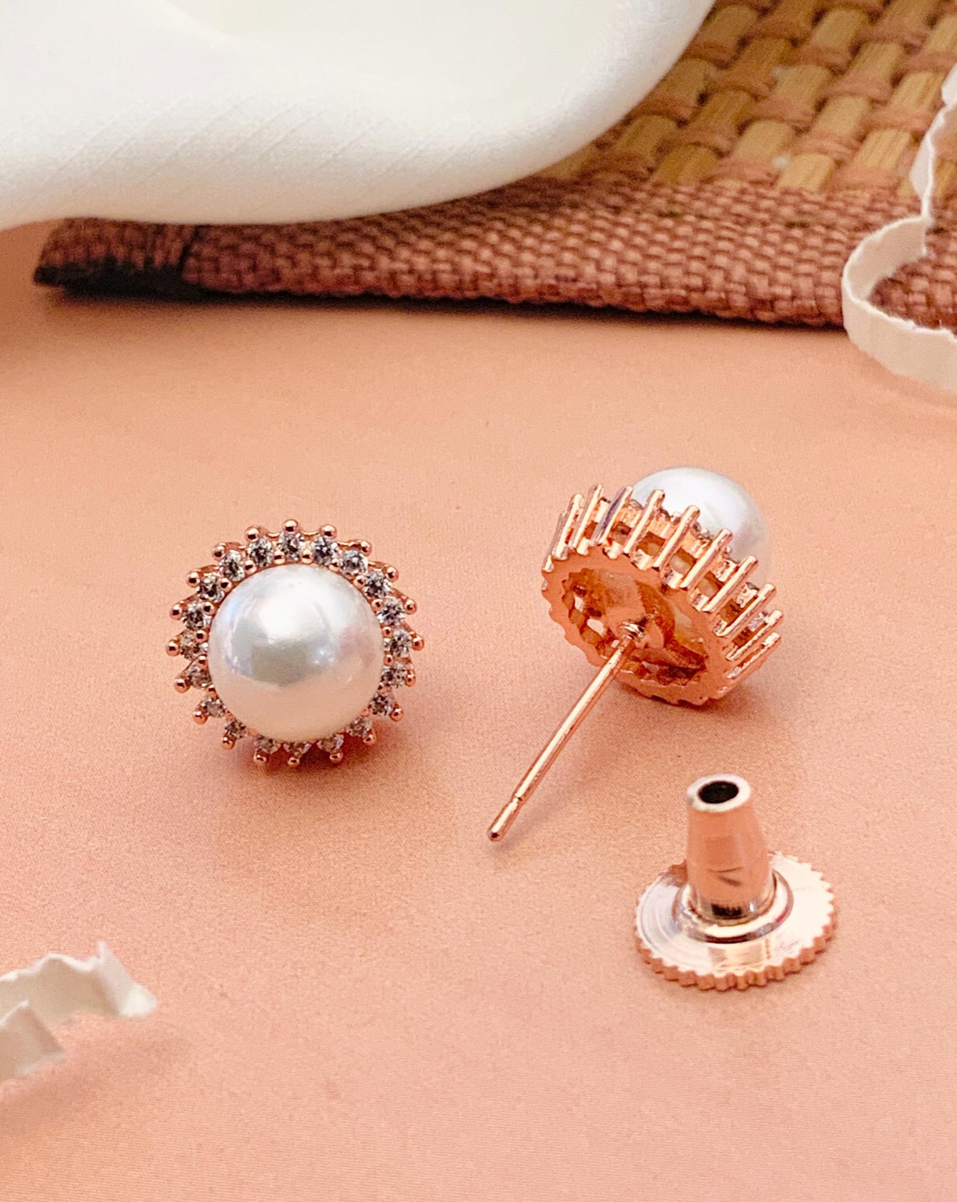 Abdesignsjewellery silver plated pearl stud earrings with rose gold halo setting and push backs